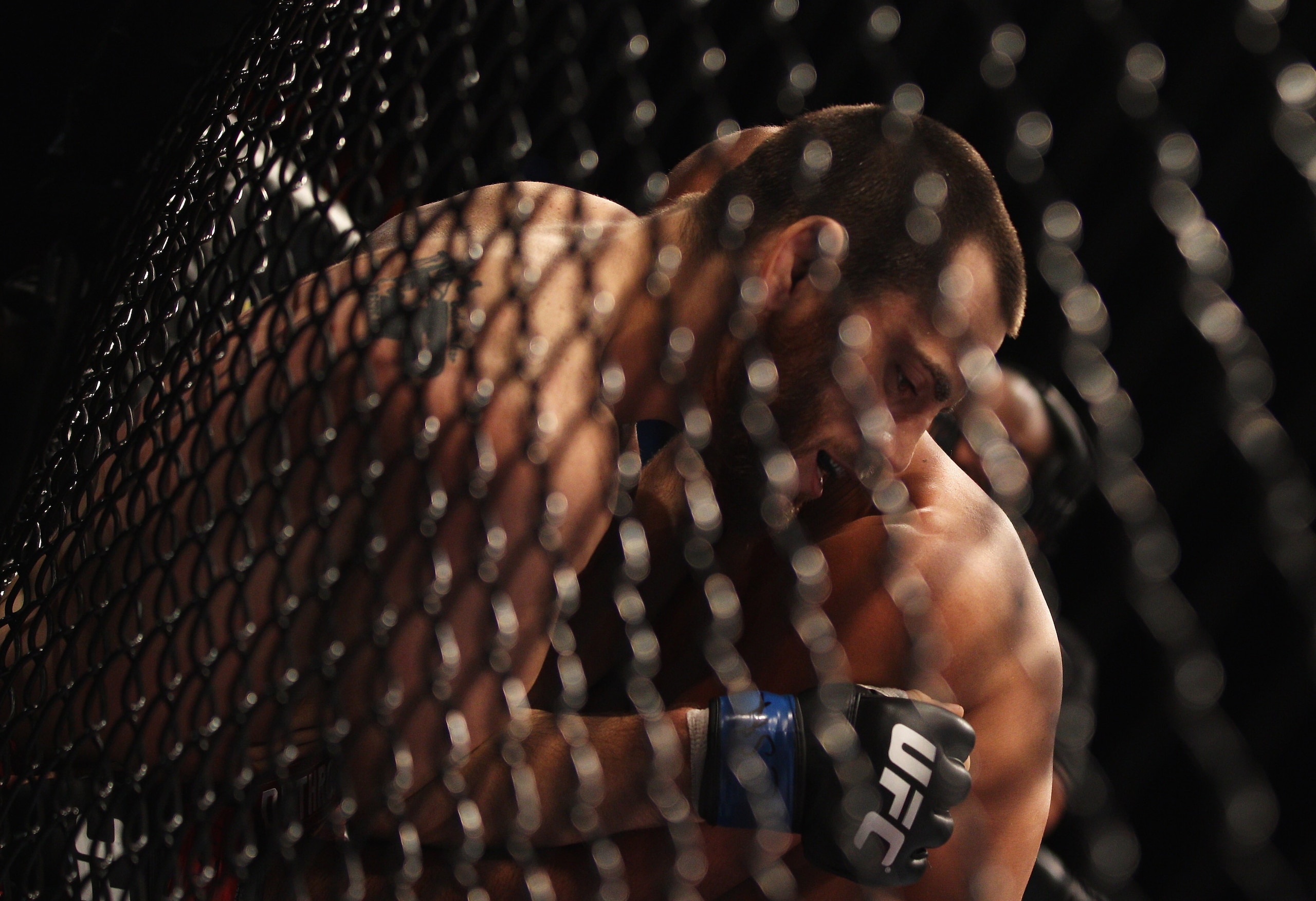 SYDNEY, AUSTRALIA - FEBRUARY 27: Jon Fitch of the USA is pinned to the cage by BJ Penn of the USA shakes hands at the end of the fight during their welterweight bout part of UFC 127 at Acer Arena on February 27, 2011 in Sydney, Australia. (Photo by Mark SYDNEY, AUSTRALIA - FEBRUARY 27: Jon Fitch of the USA is pinned to the cage by BJ Penn of the USA shakes hands at the end of the fight during their welterweight bout part of UFC 127 at Acer Arena on February 27, 2011 in Sydney, Australia. (Photo by Mark