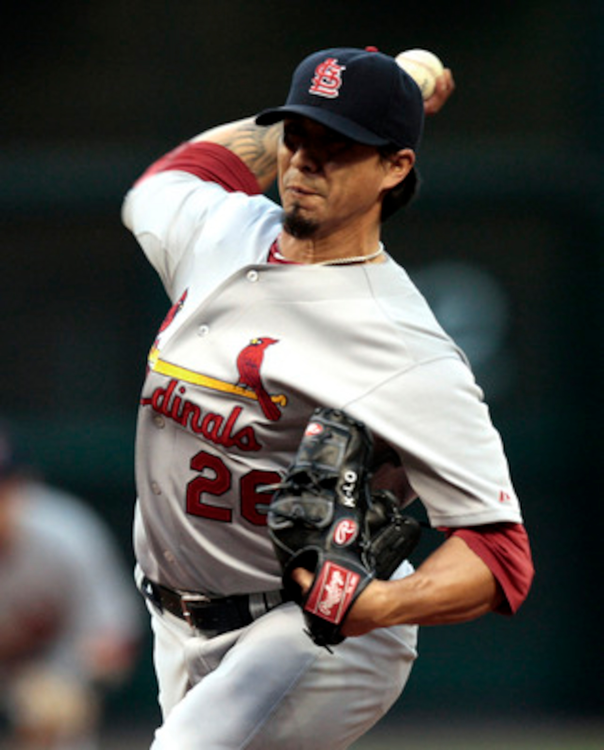 HOUSTON - APRIL 27:  Pitcher Kyle Lohse #26 of the St. Louis Cardinals throws in the first inning against the Houston Astros at Minute Maid Park on April 27, 2011 in Houston, Texas.  (Photo by Bob Levey/Getty Images)