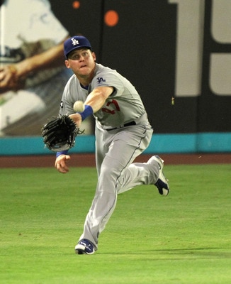 MIAMI GARDENS, FL - APRIL 26:  Jerry Sands #47 of the Los Angeles Dodgers catches a fly ball during a game against the Florida Marlins at Sun Life Stadium on April 26, 2011 in Miami Gardens, Florida.  (Photo by Mike Ehrmann/Getty Images)