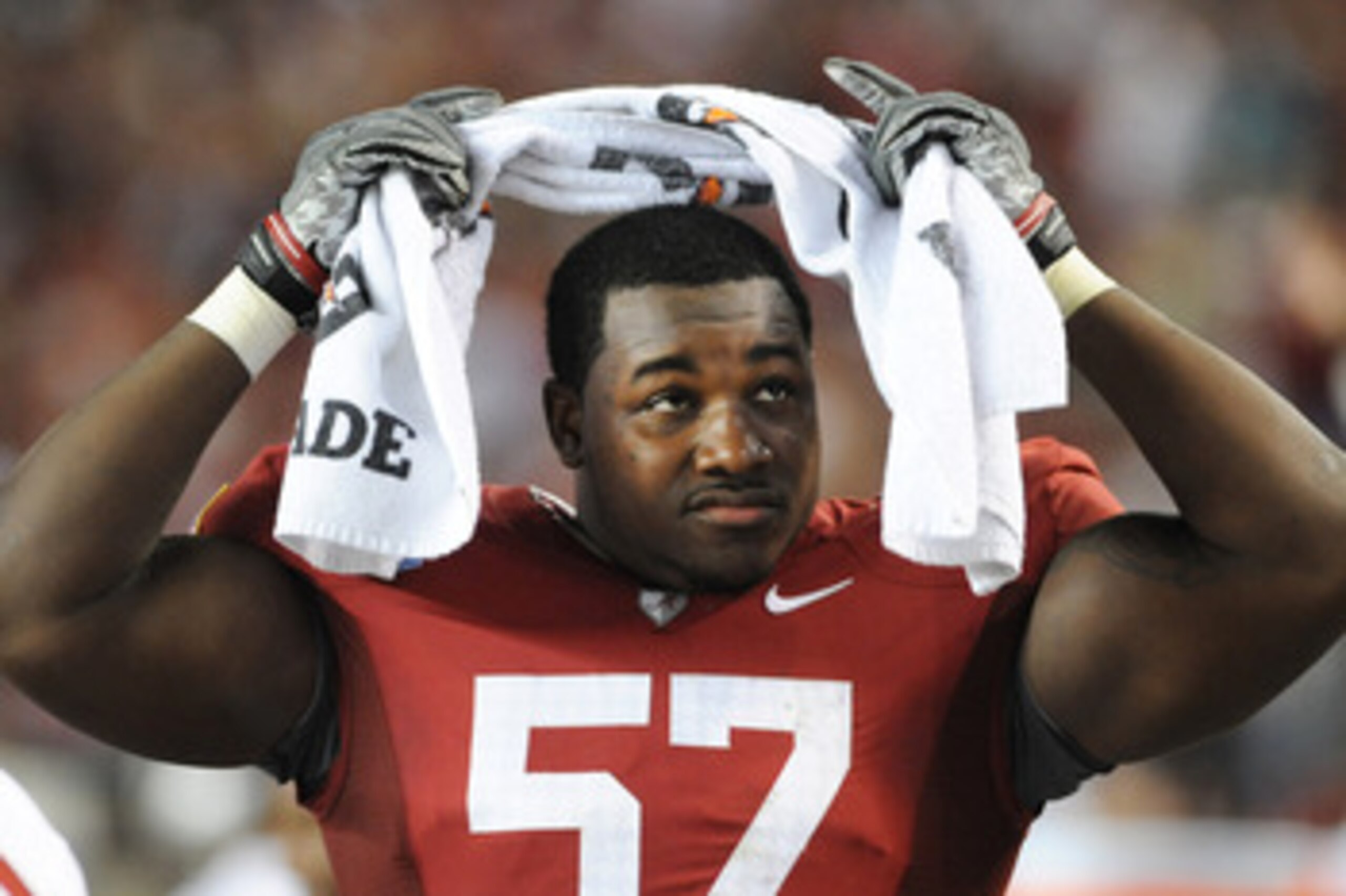 TUSCALOOSA, AL - NOVEMBER 13: Defensive lineman Marcell Dareus #57 of the Alabama Crimson Tide watches play against the Mississippi State Bulldogs November 13, 2010 at Bryant-Denny Stadium in Tuscaloosa, Alabama.  (Photo by Al Messerschmidt/Getty Images)