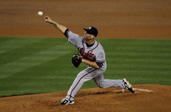 LOS ANGELES, CA - APRIL 18:  Tim Hudson #15 of the Atlanta Braves throws a pitch against the Los Angeles Dodgers on April 18, 2011 at Dodger Stadium in Los Angeles, California.  (Photo by Stephen Dunn/Getty Images)
