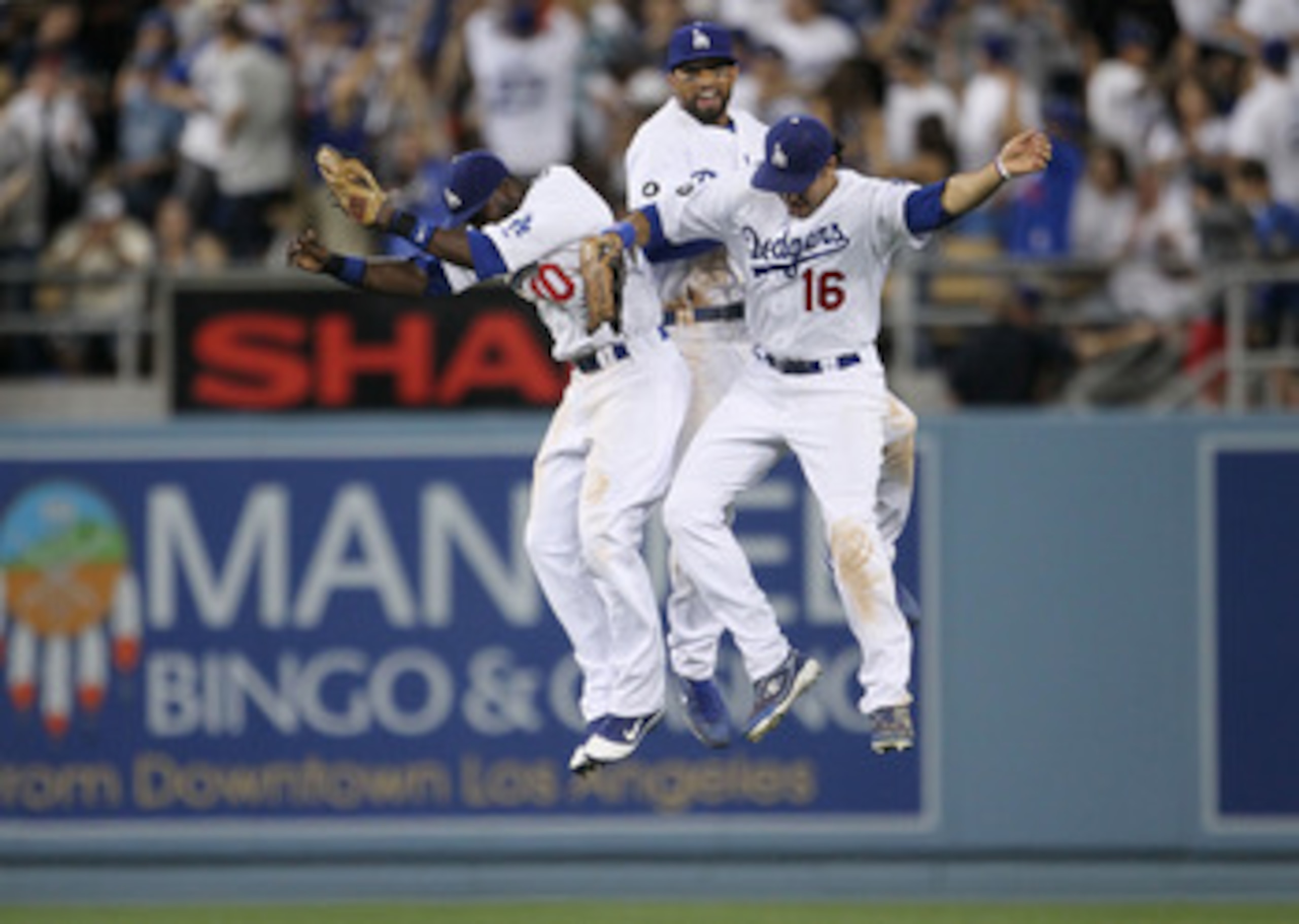 LOS ANGELES, CA - MARCH 31:  Tony Gwynn #10, Matt Kemp #27 and Andre Ethier #16 of the Los Angeles Dodgers celebrate their 2-1 win over the San Francisco Giants on Opening Day at Dodger Stadium on March 31, 2011 in Los Angeles, California.  (Photo by Jeff