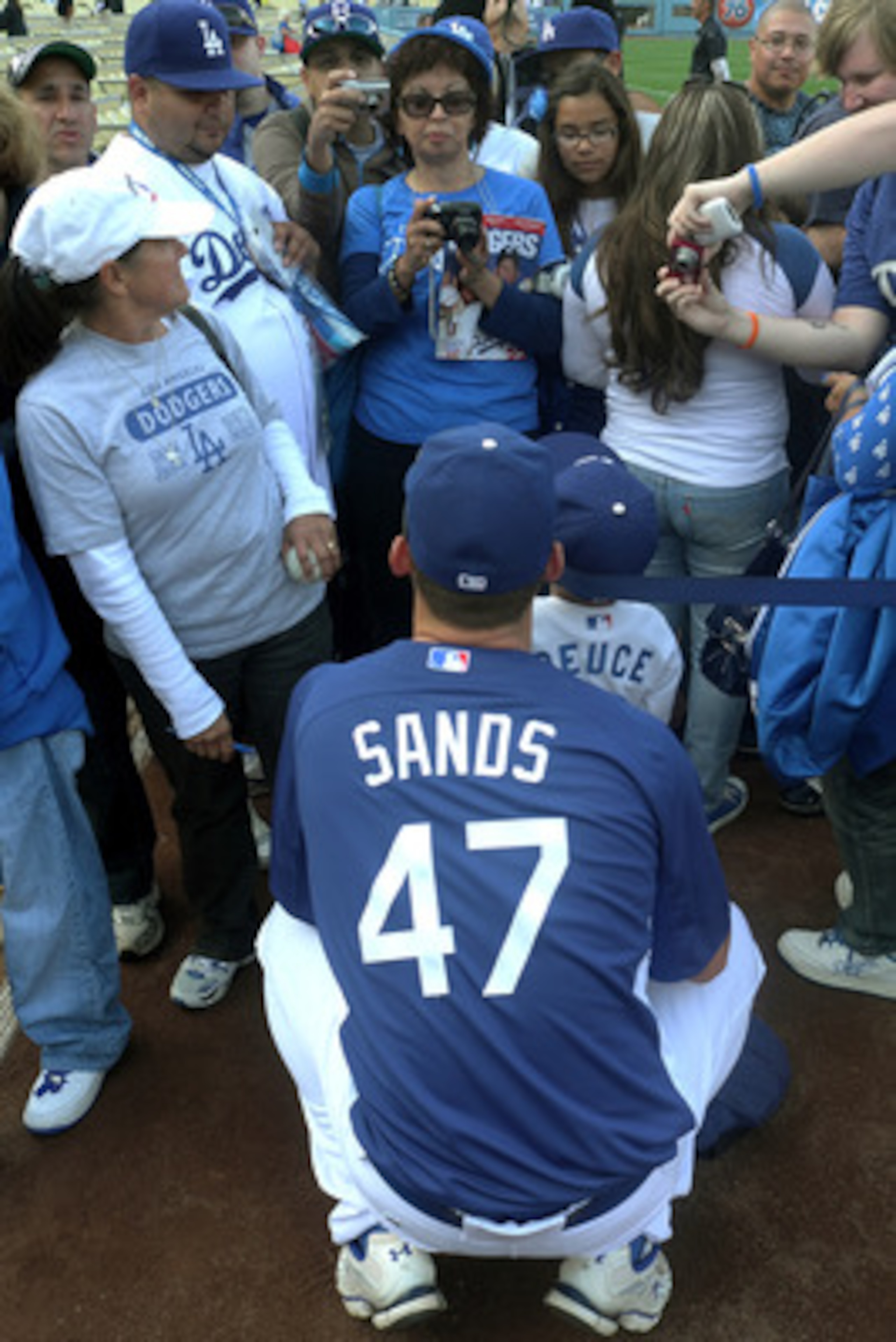 LOS ANGELES - APRIL 19:  Rookie Jerry Sands #47 of the Los Angeles Dodgers poses for a photo for fans before the game with the Atlanta Braves on April 19, 2011 at Dodger Stadium in Los Angeles, California.   (Photo by Stephen Dunn/Getty Images)