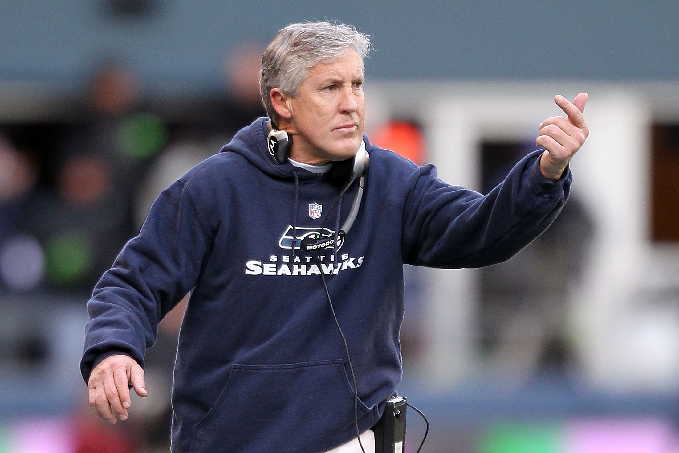 SEATTLE, WA - JANUARY 08:  Head coach Pete Carroll of the Seattle Seahawks reacts in the first half as the Seahawks take on the New Orleans Saints during the 2011 NFC wild-card playoff game at Qwest Field on January 8, 2011 in Seattle, Washington.  (Photo