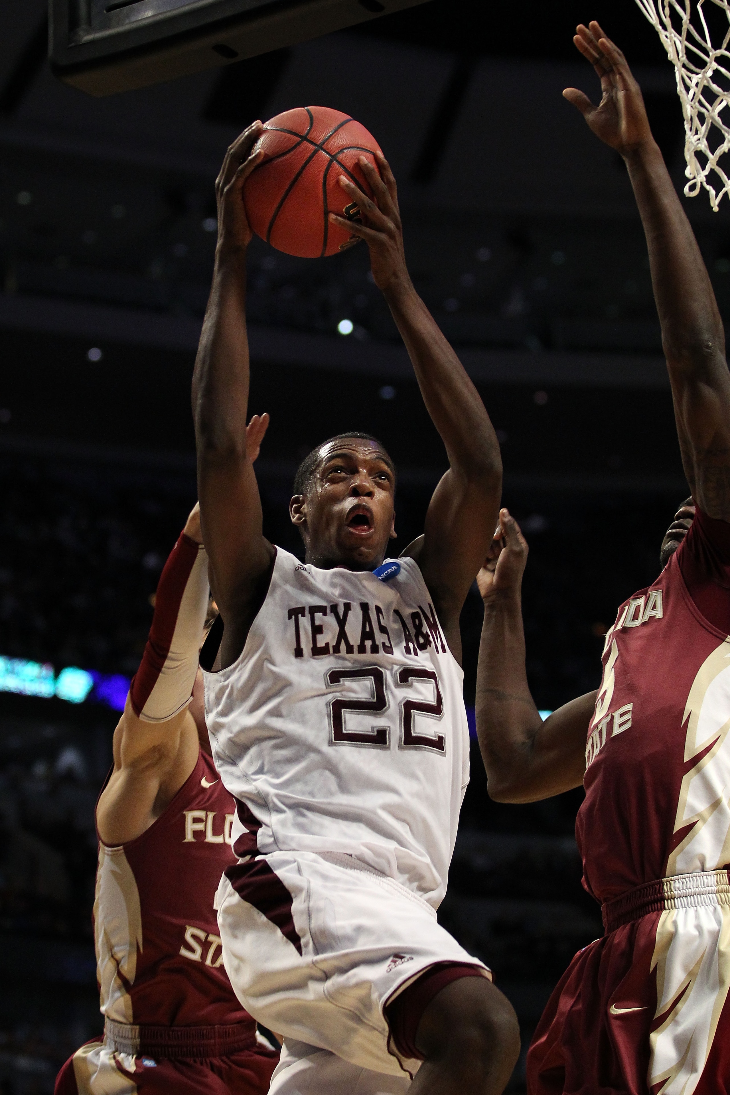 CHICAGO, IL - MARCH 18: Khris Middleton #22 of the Texas A&M Aggies shoots against the Florida State Seminoles in the first half during the second round of the 2011 NCAA men's basketball tournament at the United Center on March 18, 2011 in Chicago, Illin CHICAGO, IL - MARCH 18: Khris Middleton #22 of the Texas A&M Aggies shoots against the Florida State Seminoles in the first half during the second round of the 2011 NCAA men's basketball tournament at the United Center on March 18, 2011 in Chicago, Illin