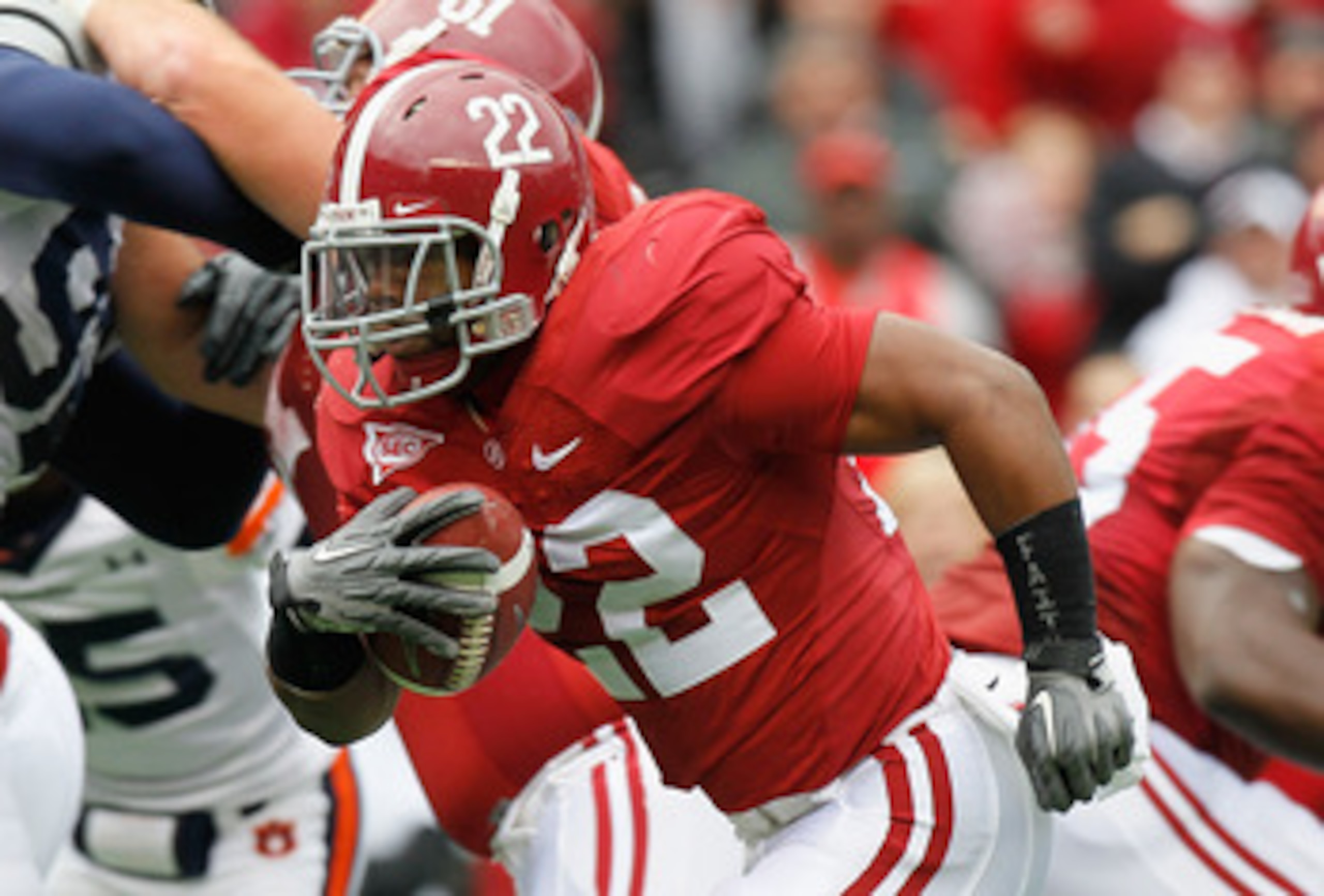 TUSCALOOSA, AL - NOVEMBER 26:  Mark Ingram #22 of the Alabama Crimson Tide rushes for a touchdown against the Auburn Tigers at Bryant-Denny Stadium on November 26, 2010 in Tuscaloosa, Alabama.  (Photo by Kevin C. Cox/Getty Images)
