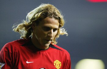 MANCHESTER, ENGLAND - FEBRUARY 11:  Diego Forlan of Manchester United at the end of the FA Barclaycard Premiership match between Manchester United and Middlesbrough at Old Trafford on February 11, 2004 in Manchester, England.  (Photo by Clive Mason/Getty