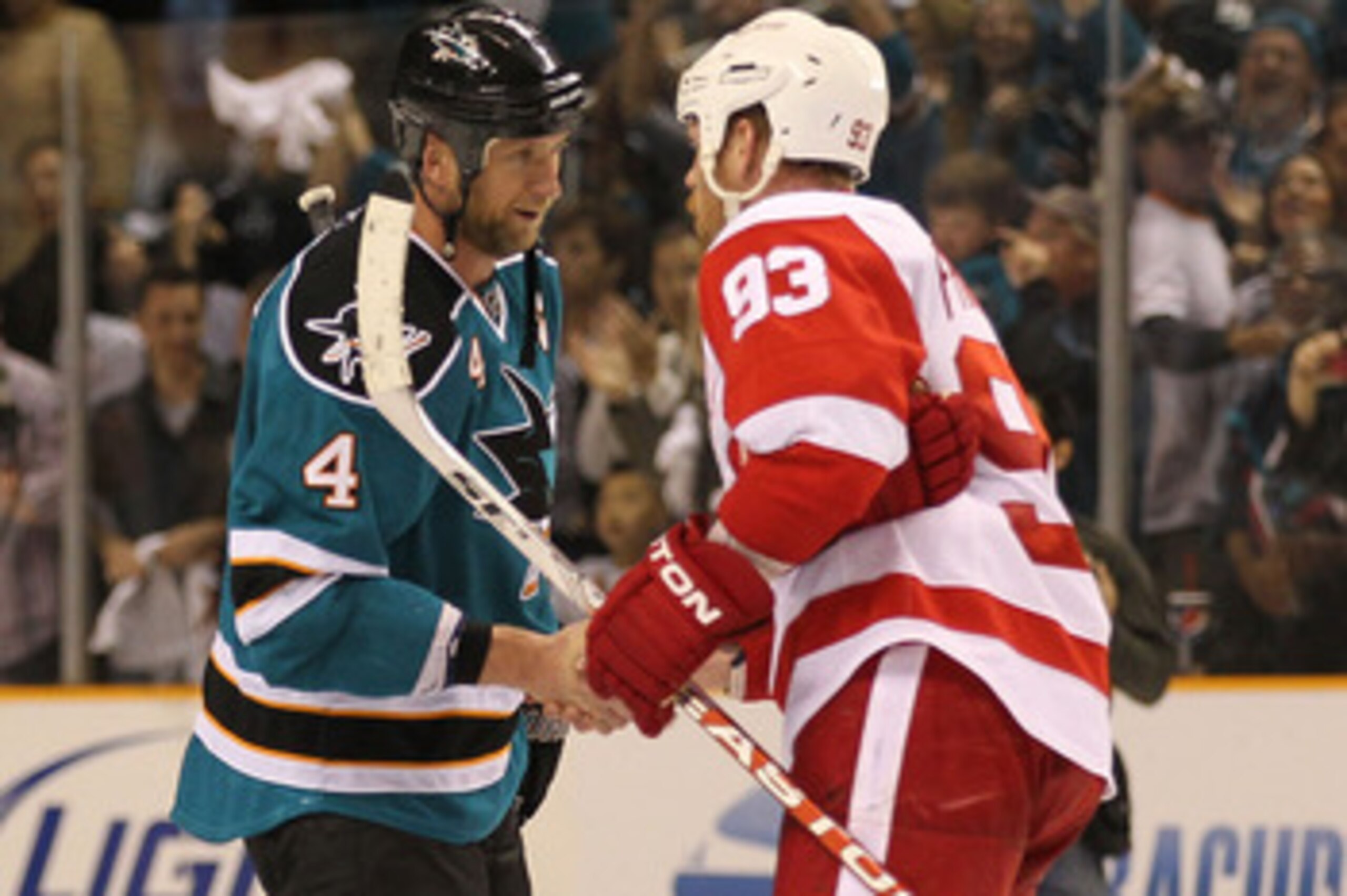SAN JOSE, CA - MAY 8: Rob Blake #4 of the San Jose Sharks shakes hands with Johan Franzen #93 of the Detroit Red Wings after Game Five of the Western Conference Semifinals during the 2010 NHL Stanley Cup Playoffs at HP Pavilion on May 8, 2010 in San Jose,