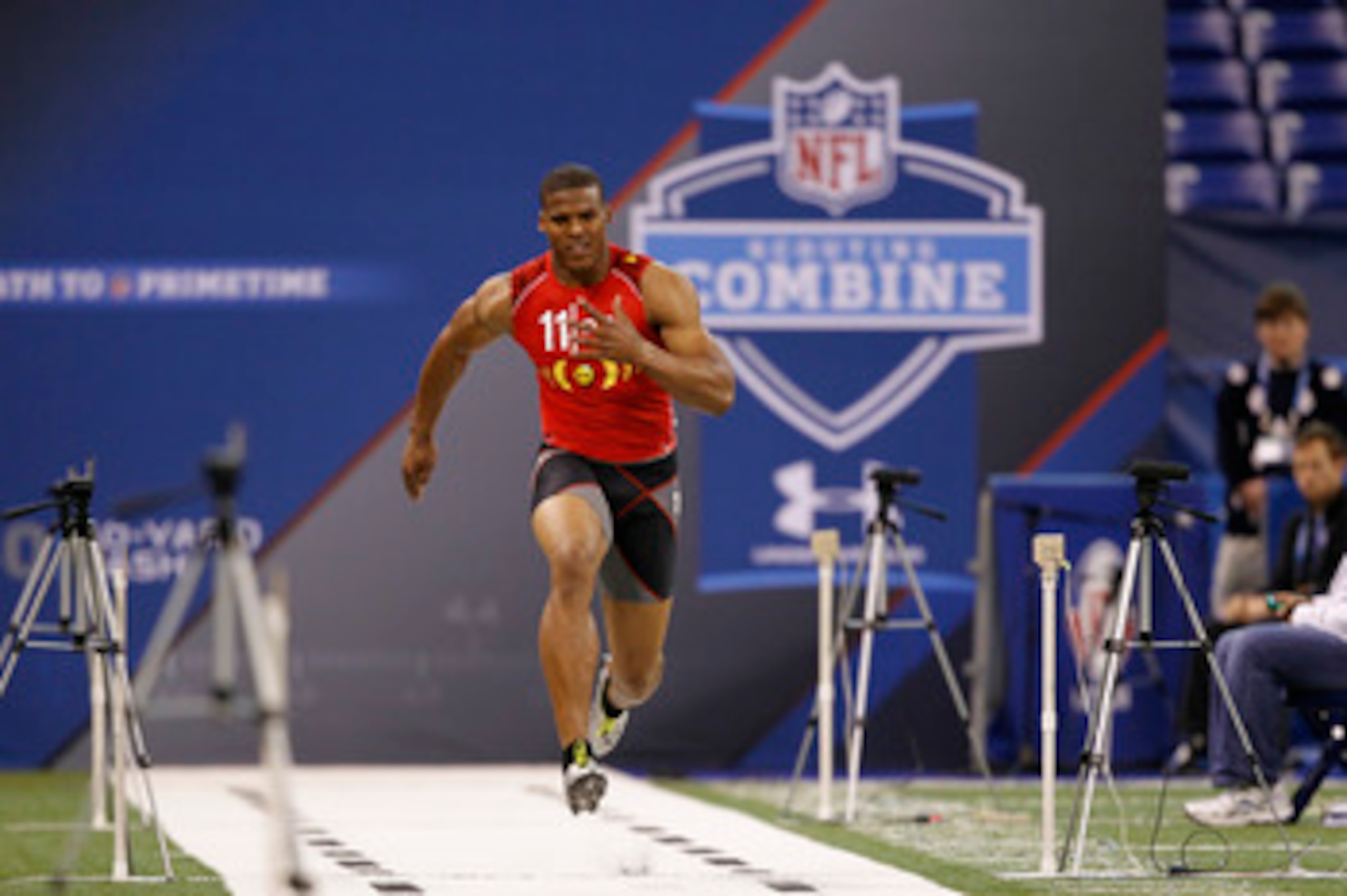 INDIANAPOLIS, IN - FEBRUARY 27: Cam Newton runs the 40-yard dash during the 2011 NFL Scouting Combine at Lucas Oil Stadium on February 27, 2011 in Indianapolis, Indiana. (Photo by Joe Robbins/Getty Images)
