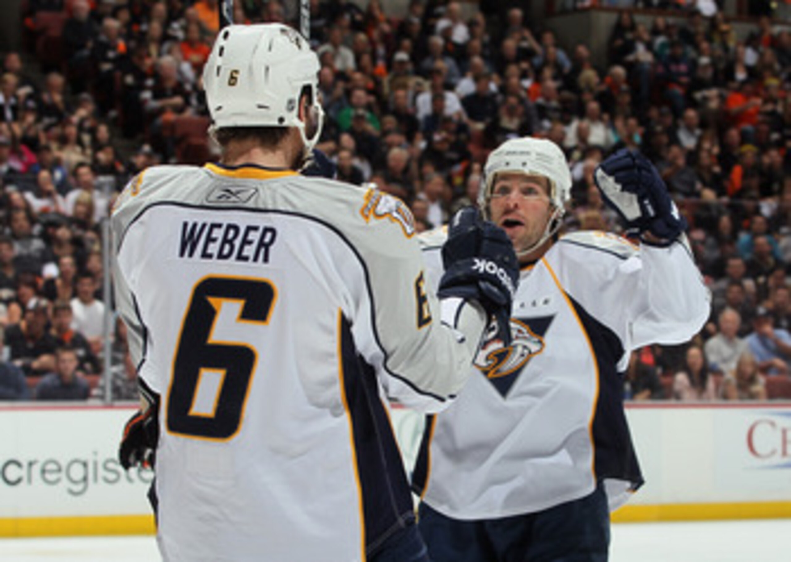 ANAHEIM, CA - APRIL 15:  Mike Fisher #12 of the Nashville Predators celebrates a goal by Shea Weber #6 against the Anaheim Ducks in the second period of Game Two of the Western Conference Quarterfinals during the 2011 NHL Stanley Cup Playoffs at Honda Cen