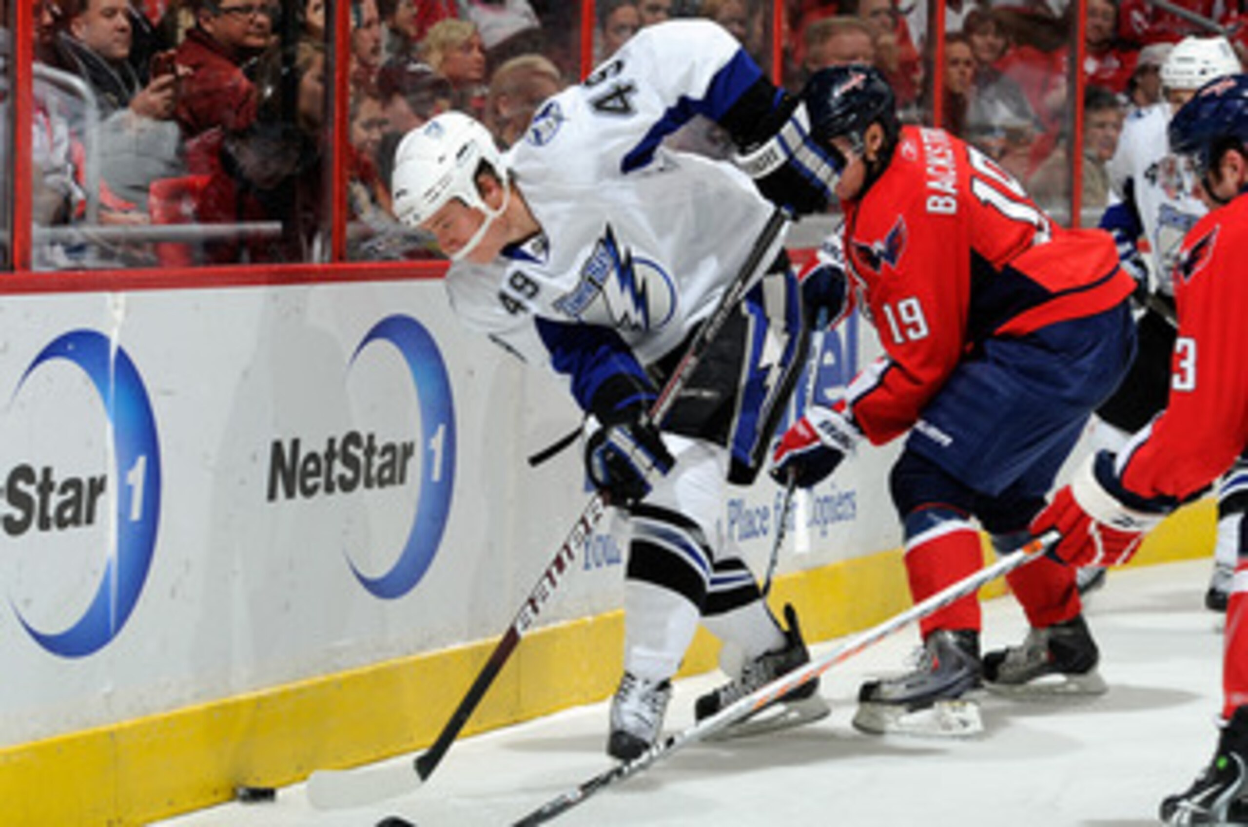 WASHINGTON - NOVEMBER 26: Blair Jones #49 of the Tampa Bay Lightning battles for the puck with Nicklas Backstrom #19 of the Washington Capitals at the Verizon Center on November 26, 2010 in Washington, DC. (Photo by Greg Fiume/Getty Images) WASHINGTON - NOVEMBER 26: Blair Jones #49 of the Tampa Bay Lightning battles for the puck with Nicklas Backstrom #19 of the Washington Capitals at the Verizon Center on November 26, 2010 in Washington, DC. (Photo by Greg Fiume/Getty Images)