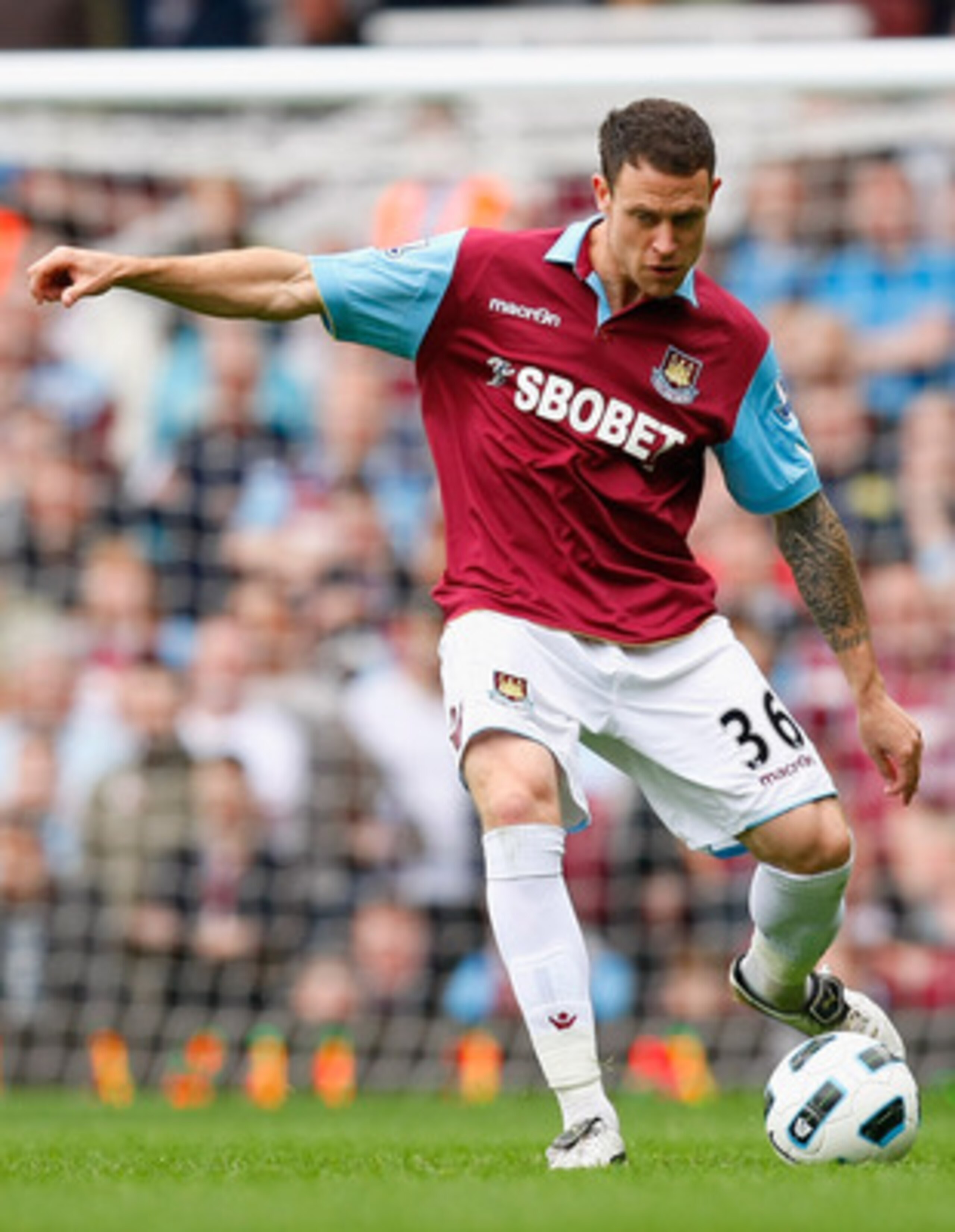 LONDON, ENGLAND - APRIL 16:  Wayne Bridge of West Ham United passes the ball during the Barclays Premier League match between West Ham United and Aston Villa at the Boleyn Ground on April 16, 2011 in London, England.  (Photo by Tom Dulat/Getty Images)