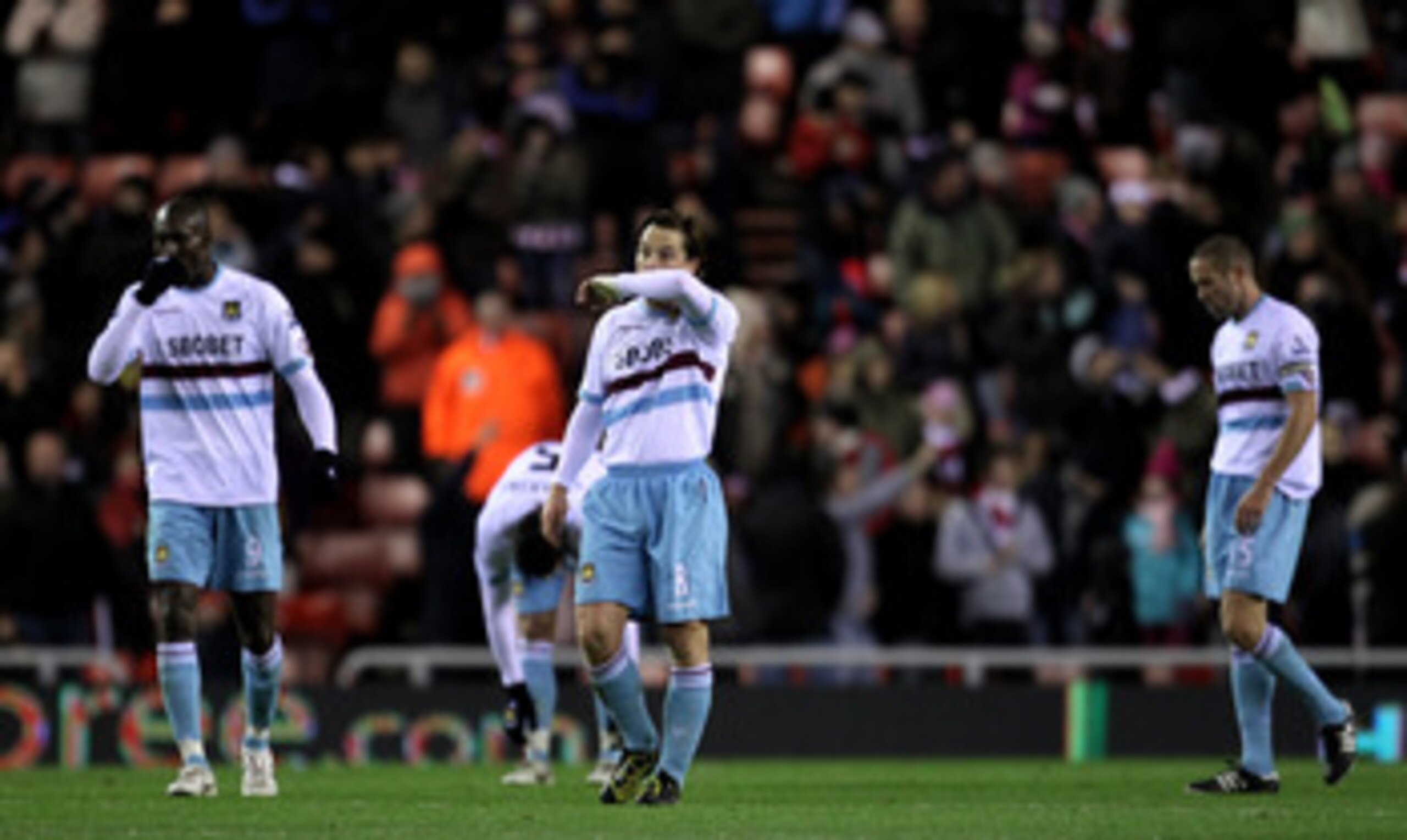 SUNDERLAND, ENGLAND - DECEMBER 05:  Scott Parker and Carlton Cole (L) of West Ham United retreat to their own half after conceding the opening goal during the Barclays Premier League match between Sunderland and West Ham United at the Stadium of Light on