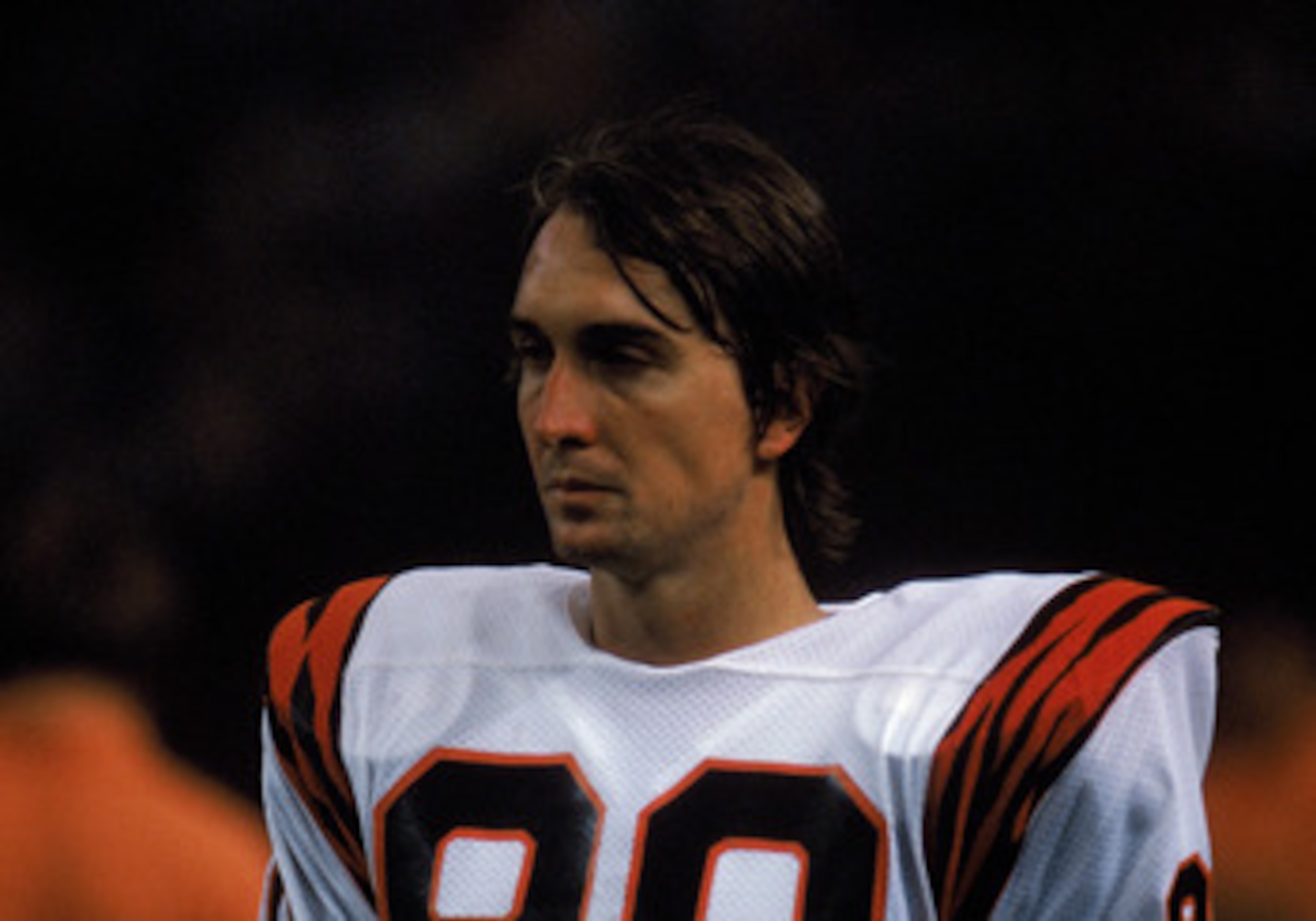 HOUSTON - 1985:  Wide receiver Cris Collinsworth #80 of the Cincinnati Bengals walks on the field during a game in the 1985 NFL Season against the Houston Oilers at the Houston Astrodome in Houston, Texas.  (Photo by Tony Duffy/Getty Images)