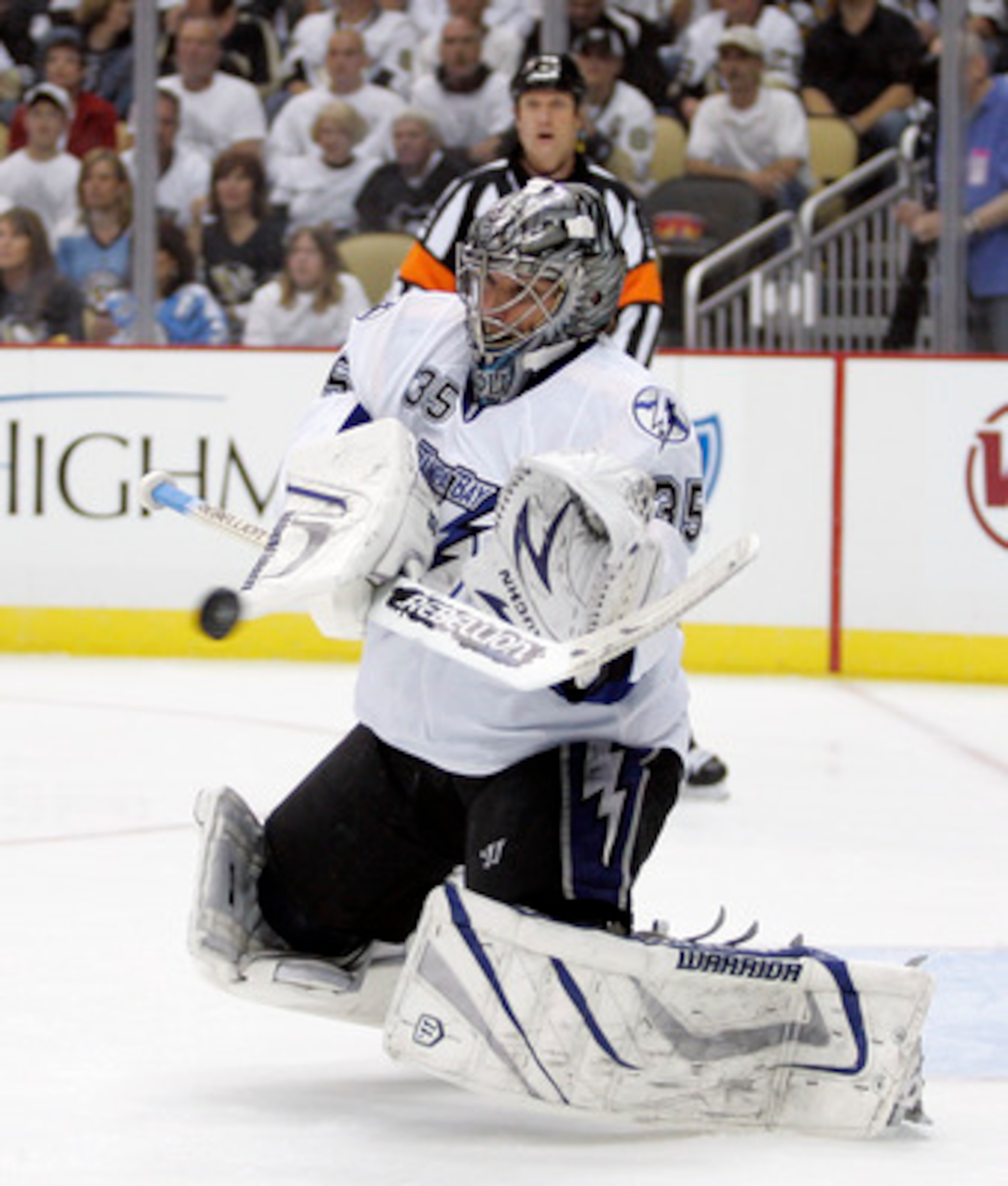 PITTSBURGH, PA - APRIL 27: Dwayne Roloson #35 of the Tampa Bay Lightning makes a save against the Pittsburgh Penguins in Game Seven of the Eastern Conference Quarterfinals during the 2011 NHL Stanley Cup Playoffs at Consol Energy Center on April 27, 2011 PITTSBURGH, PA - APRIL 27: Dwayne Roloson #35 of the Tampa Bay Lightning makes a save against the Pittsburgh Penguins in Game Seven of the Eastern Conference Quarterfinals during the 2011 NHL Stanley Cup Playoffs at Consol Energy Center on April 27, 2011