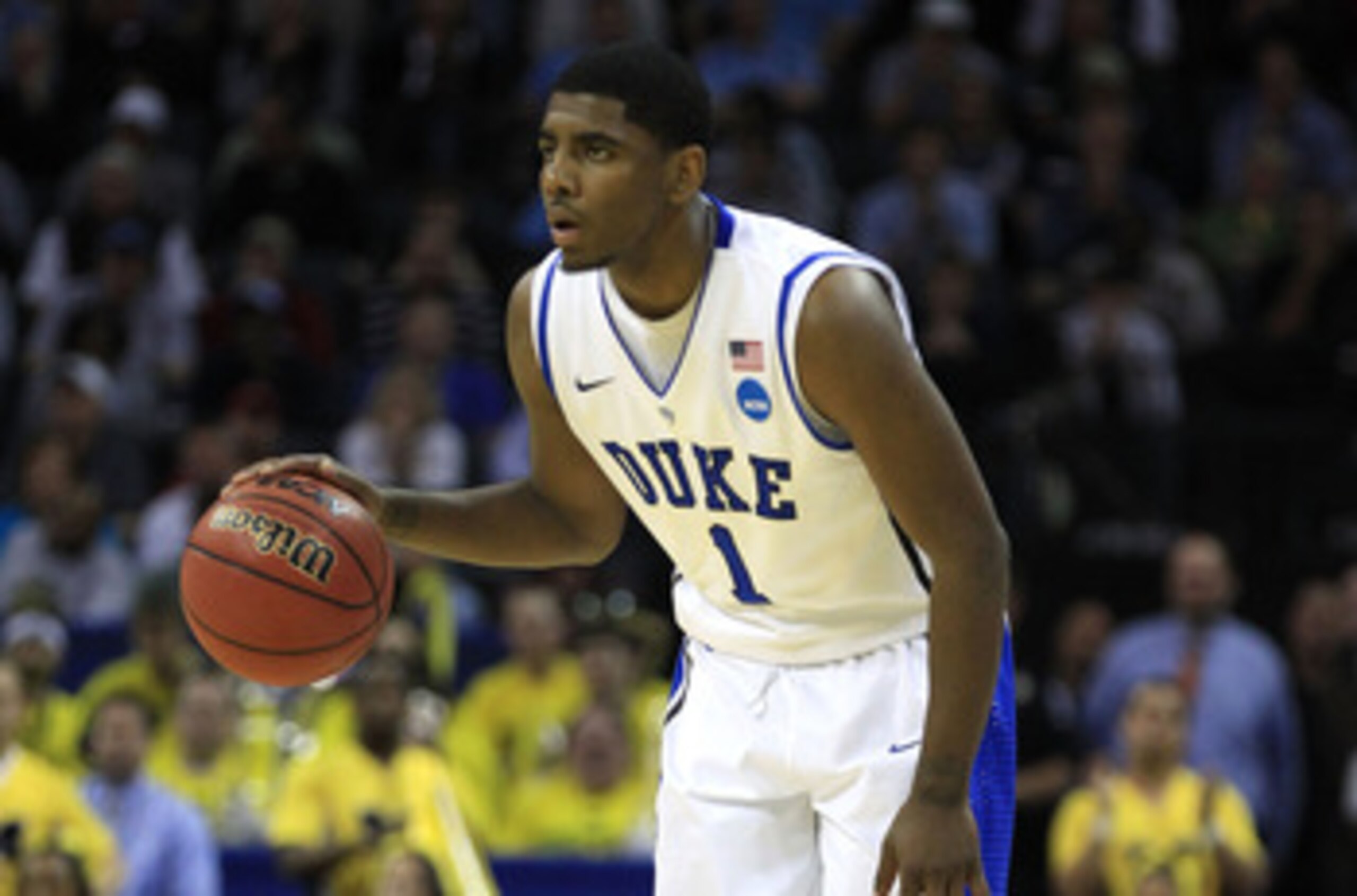 CHARLOTTE, NC - MARCH 20: Kyrie Irving #1 of the Duke Blue Devils moves the ball while taking on the Michigan Wolverines during the third round of the 2011 NCAA men's basketball tournament at Time Warner Cable Arena on March 20, 2011 in Charlotte, North CHARLOTTE, NC - MARCH 20: Kyrie Irving #1 of the Duke Blue Devils moves the ball while taking on the Michigan Wolverines during the third round of the 2011 NCAA men's basketball tournament at Time Warner Cable Arena on March 20, 2011 in Charlotte, North