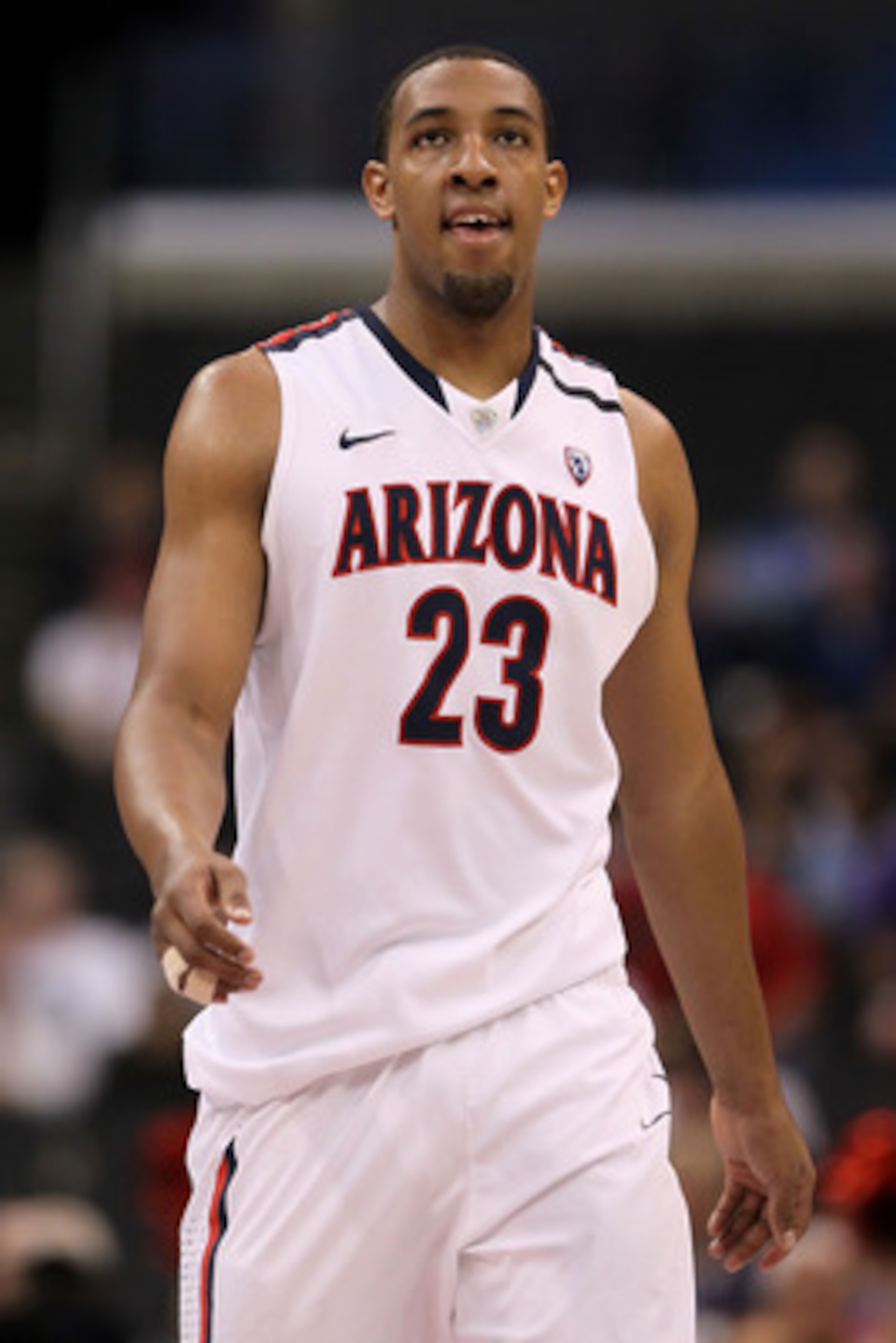 LOS ANGELES, CA - MARCH 12: Derrick Williams #23 of the Arizona Wildcats looks on in the first half while taking on the Washington Huskies in the championship game of the 2011 Pacific Life Pac-10 Men's Basketball Tournament at Staples Center on March 12, LOS ANGELES, CA - MARCH 12: Derrick Williams #23 of the Arizona Wildcats looks on in the first half while taking on the Washington Huskies in the championship game of the 2011 Pacific Life Pac-10 Men's Basketball Tournament at Staples Center on March 12,