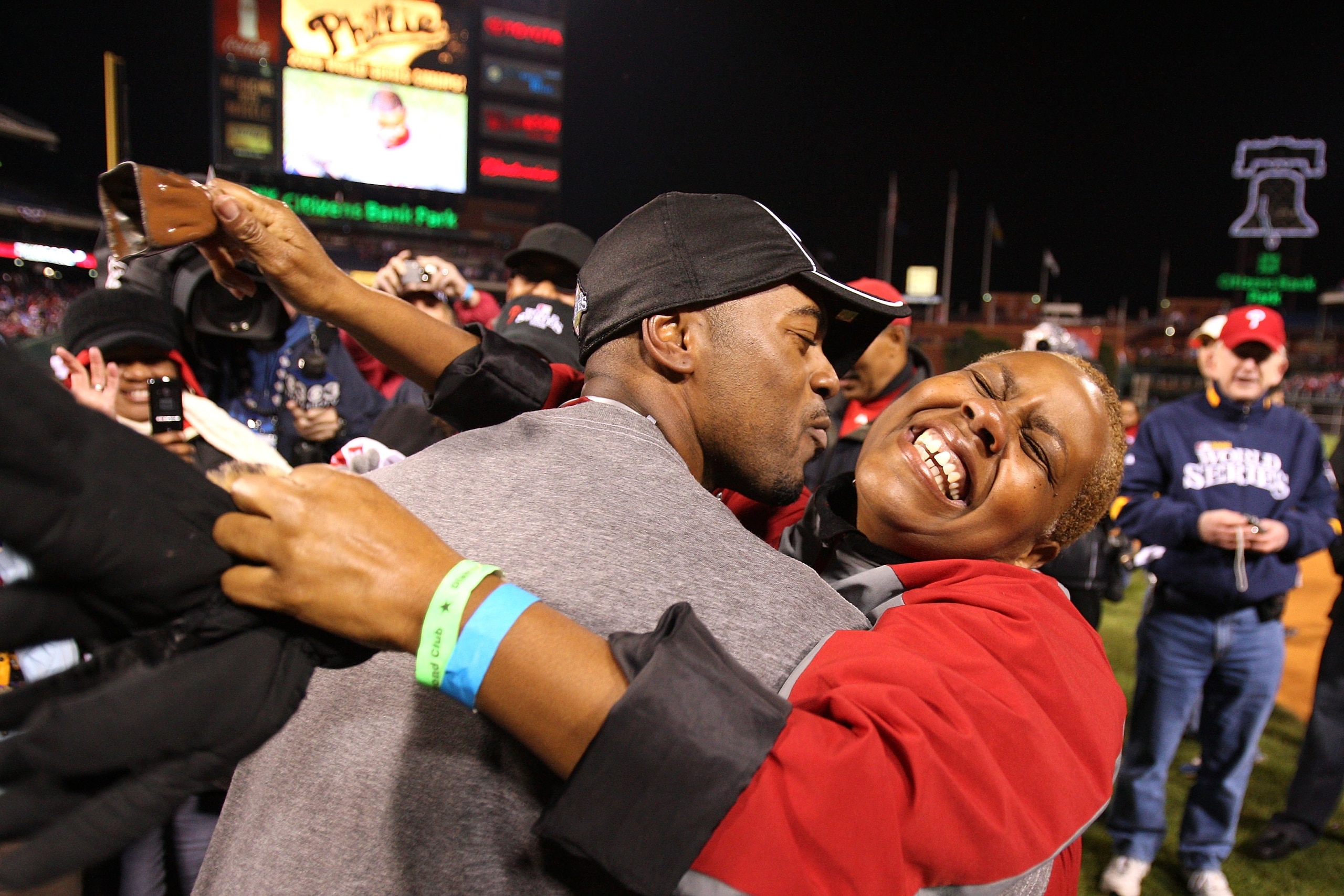 PHILADELPHIA - OCTOBER 29:  Jimmy Rollins #11 (L) of the Philadelphia Phillies celebrates winning the World Series with his mother Gigi on the field after their 4-3 win against the Tampa Bay Rays during the continuation of game five of the 2008 MLB World