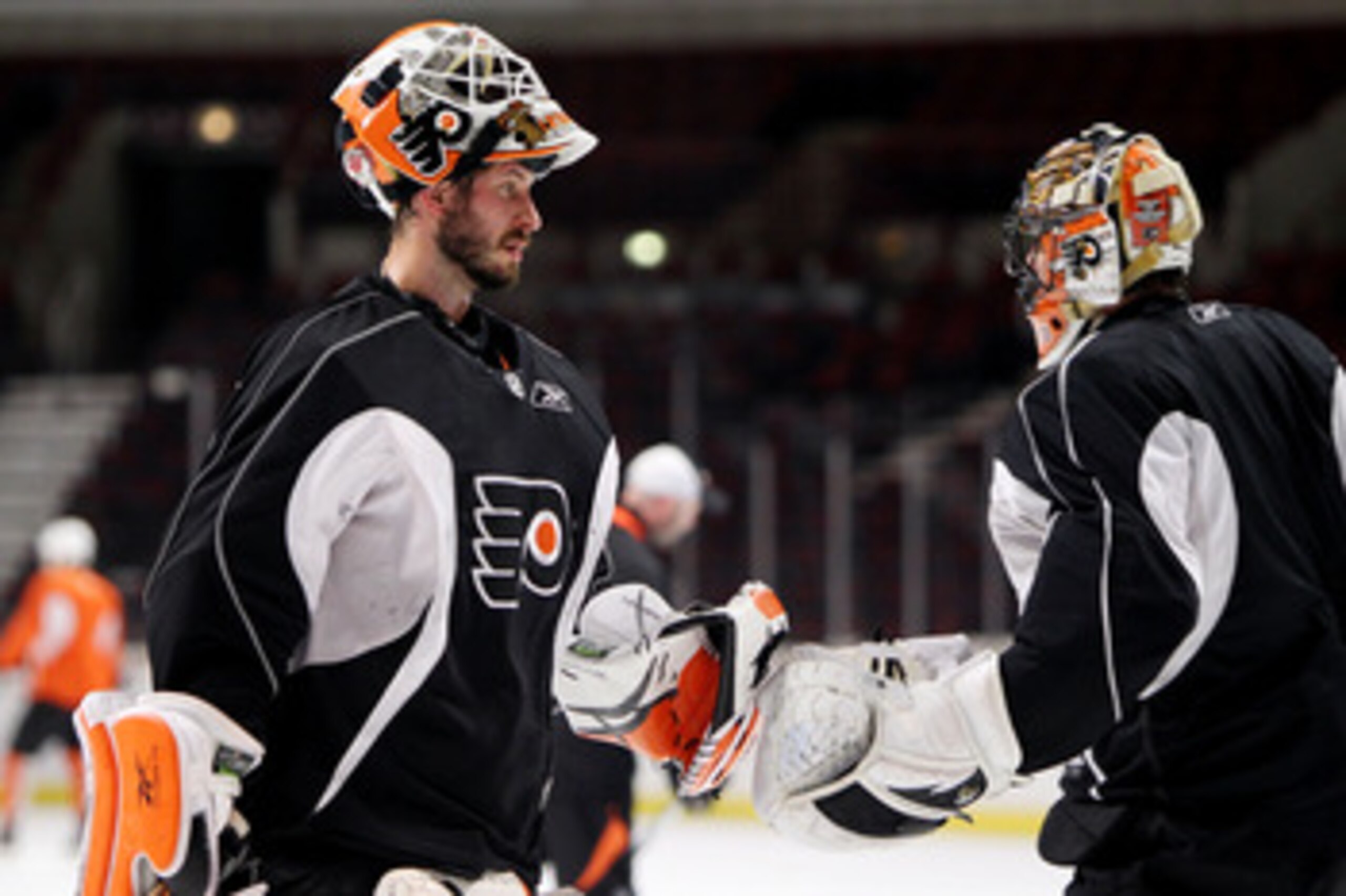 CHICAGO - MAY 30:  Michael Leighton #49 and Brian Boucher #33 of the Philadelphia Flyers practice for the 2010 NHL Stanley Cup Finals at the United Center on May 30, 2010 in Chicago, Illinois.  (Photo by Andre Ringuette/Getty Images)