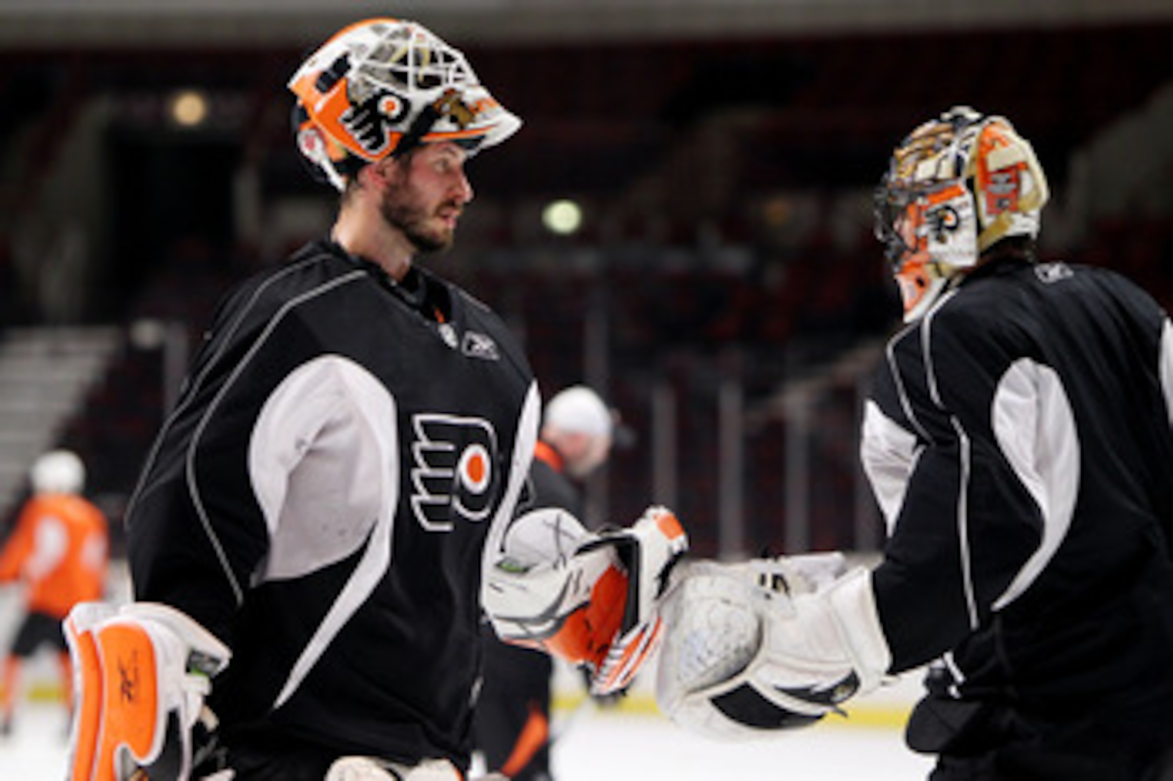 CHICAGO - MAY 30: Michael Leighton #49 and Brian Boucher #33 of the Philadelphia Flyers practice for the 2010 NHL Stanley Cup Finals at the United Center on May 30, 2010 in Chicago, Illinois. (Photo by Andre Ringuette/Getty Images) CHICAGO - MAY 30: Michael Leighton #49 and Brian Boucher #33 of the Philadelphia Flyers practice for the 2010 NHL Stanley Cup Finals at the United Center on May 30, 2010 in Chicago, Illinois. (Photo by Andre Ringuette/Getty Images)