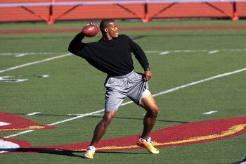 SAN DIEGO, CA - FEBRUARY 10:  2010 Heisman Trophy winning quarterback Cam Newton of the Auburn Tigers throws the ball during his workout routine for the media at Cathedral High School's sports stadium on February 10, 2011 in San Diego, California.  (Photo