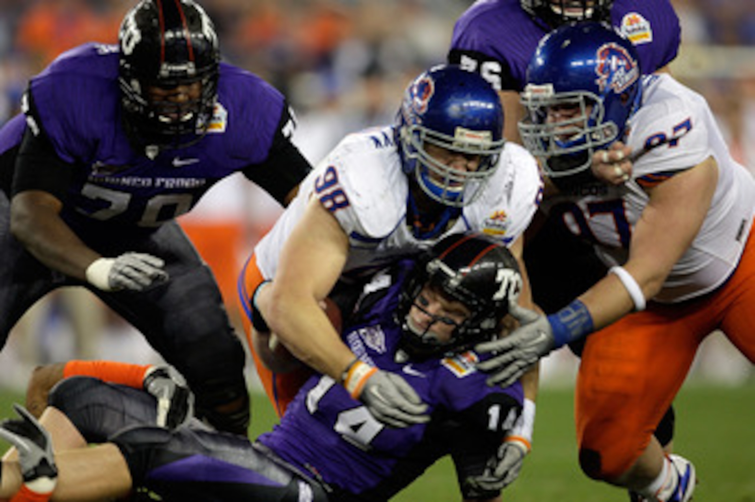 GLENDALE, AZ - JANUARY 04: Ryan Winterswyk #98 of the Boise State Broncos tackles quarterback Andy Dalton #14 of the TCU Horned Frogs on a quarterback keeper in the third quarter during the Tostitos Fiesta Bowl at the Universtity of Phoenix Stadium on Ja GLENDALE, AZ - JANUARY 04: Ryan Winterswyk #98 of the Boise State Broncos tackles quarterback Andy Dalton #14 of the TCU Horned Frogs on a quarterback keeper in the third quarter during the Tostitos Fiesta Bowl at the Universtity of Phoenix Stadium on Ja