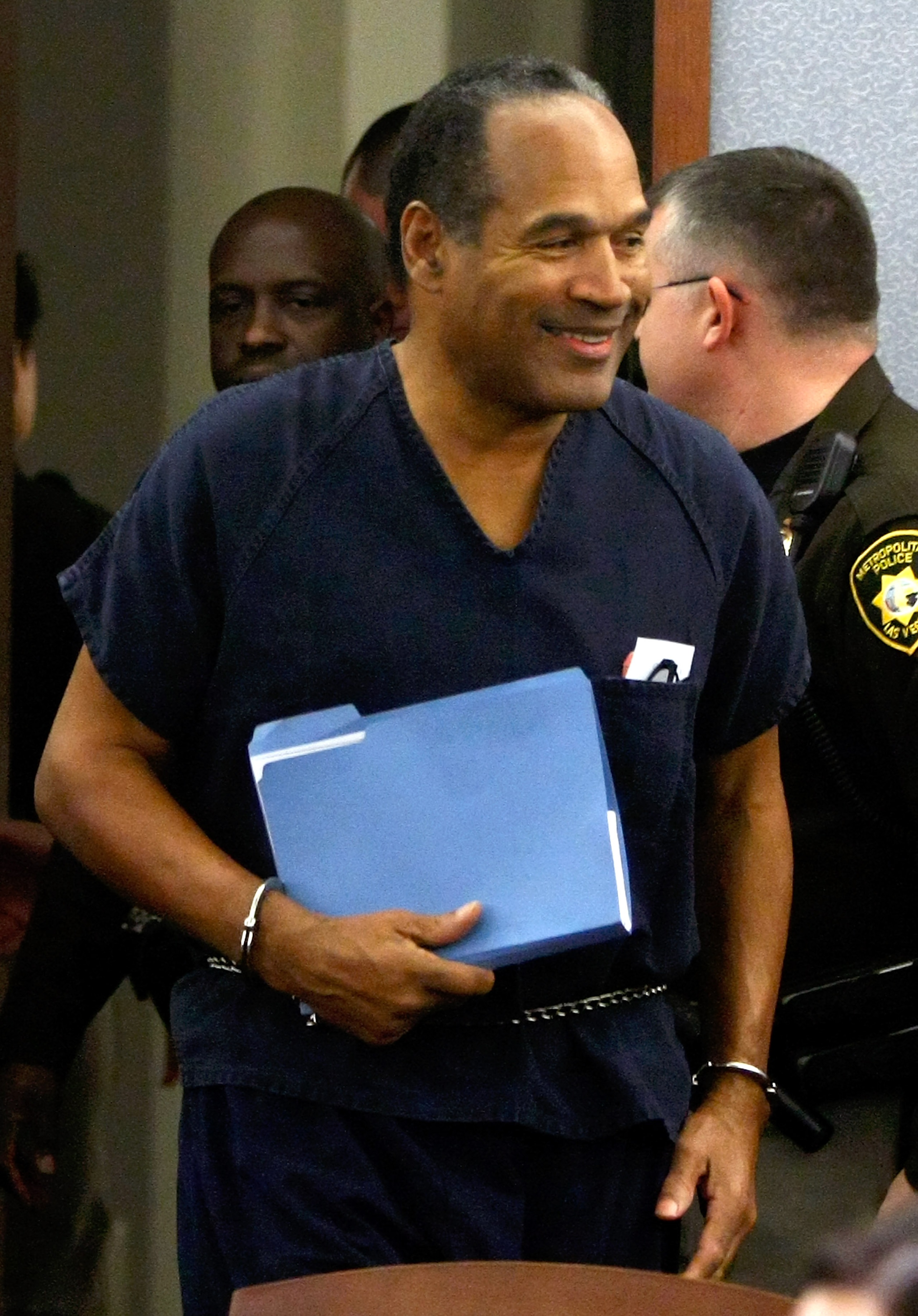 LAS VEGAS - DECEMBER 05: O.J. Simpson smiles as he arrives in court for his sentencing hearing at the Clark County Regional Justice Center December 5, 2008 in Las Vegas, Nevada. Simpson and co-defendant Clarence 'C.J.' Stewart were sentenced on 12 charge LAS VEGAS - DECEMBER 05: O.J. Simpson smiles as he arrives in court for his sentencing hearing at the Clark County Regional Justice Center December 5, 2008 in Las Vegas, Nevada. Simpson and co-defendant Clarence 'C.J.' Stewart were sentenced on 12 charge