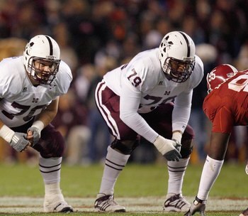 TUSCALOOSA, AL - NOVEMBER 15:  J.C. Brignone #70 and Derek Sherrod #79of the Mississippi State Bulldogs get ready on the line of scrimmage during the game against the Alabama Crimson Tide at Bryant-Denny Stadium on November 15, 2008 in Tuscaloosa, Alabama