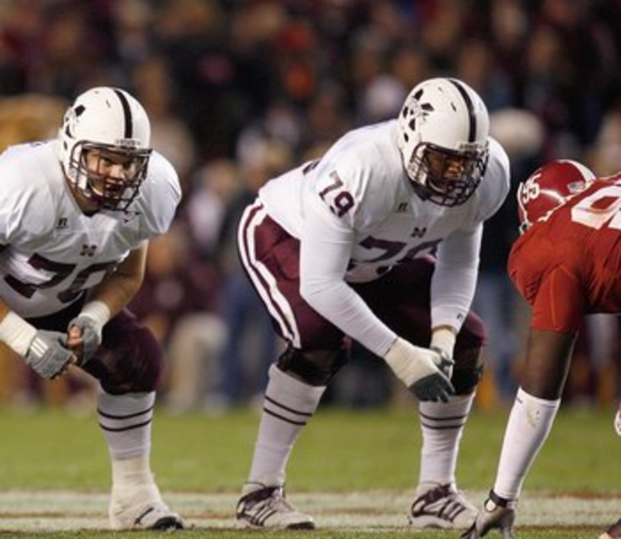 TUSCALOOSA, AL - NOVEMBER 15:  J.C. Brignone #70 and Derek Sherrod #79of the Mississippi State Bulldogs get ready on the line of scrimmage during the game against the Alabama Crimson Tide at Bryant-Denny Stadium on November 15, 2008 in Tuscaloosa, Alabama