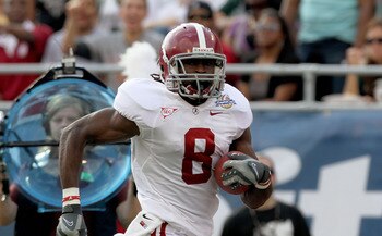 ORLANDO, FL - JANUARY 01:  Julio Jones #8 of the Alabama Crimson Tide rushes for a touchdown during the Capitol One Bowl against the Michigan State Spartans at the Florida Citrus Bowl on January 1, 2011 in Orlando, Florida.  (Photo by Mike Ehrmann/Getty I