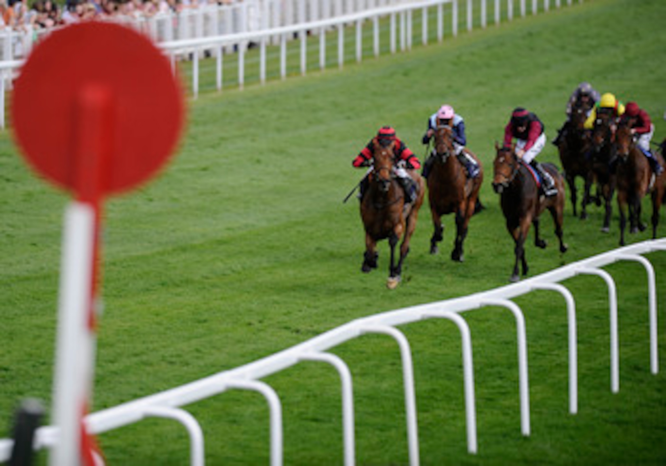 EPSOM, ENGLAND - APRIL 20:  Sunny Game ridden by jockey Jamie Spencer (L) win the Investec Great Metropolitan Handicap Stakes during Epsom Races at Epsom racecourse on April 20, 2011 in Epsom, England.  (Photo by Alan Crowhurst/ Getty Images)
