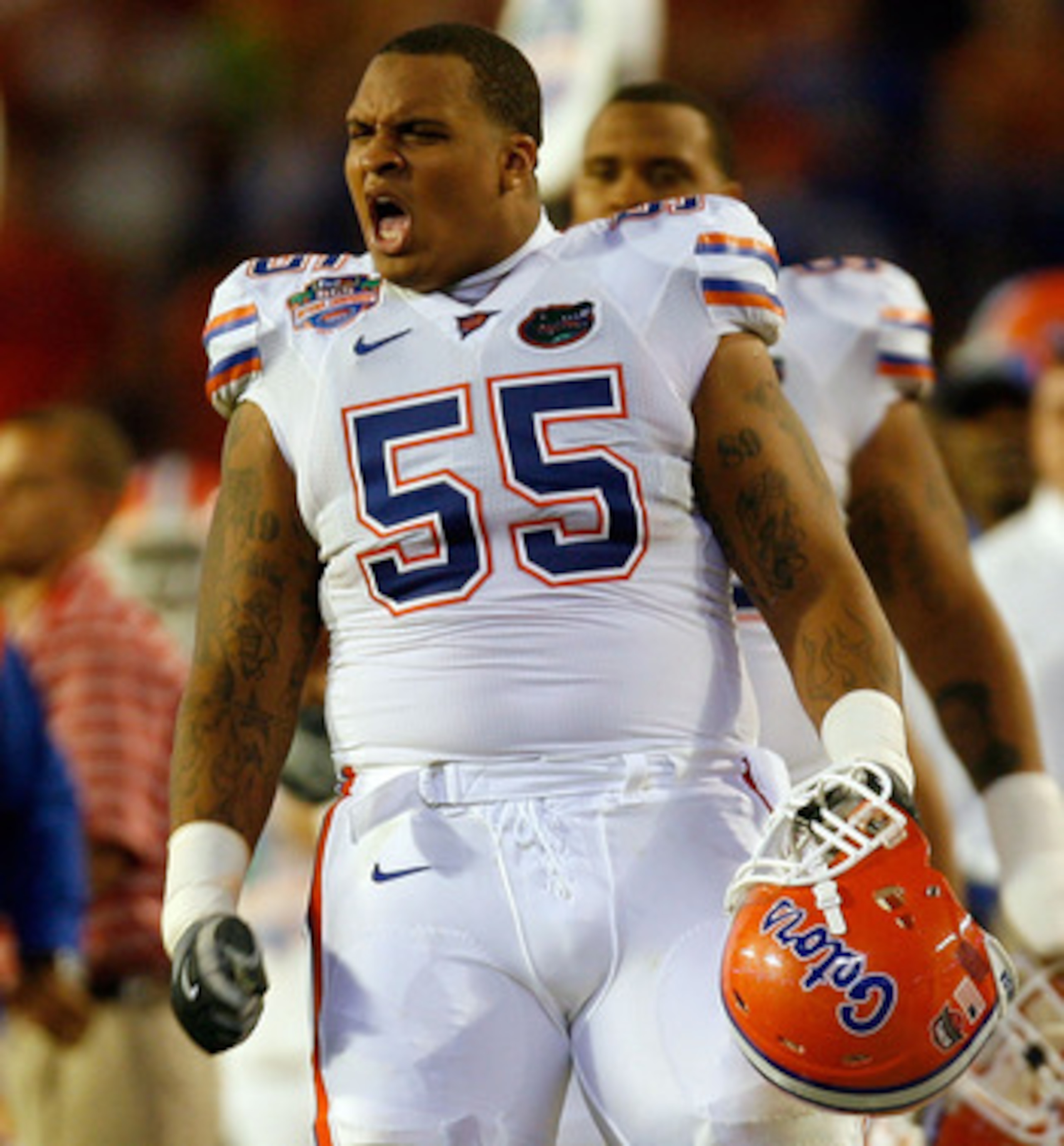 MIAMI - JANUARY 08: Mike Pouncey #55 of the Florida Gators reacts after a play against the Oklahoma Sooners in the FedEx BCS National Championship Game at Dolphin Stadium on January 8, 2009 in Miami, Florida.  (Photo by Eliot J. Schechter/Getty Images)