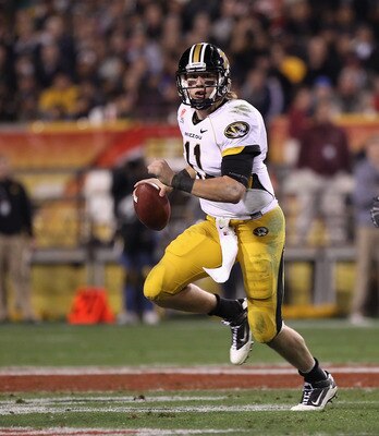 TEMPE, AZ - DECEMBER 28:  Quarterback Blaine Gabbert #11 of the Missouri Tigers drops back to pass during the Insight Bowl against the Iowa Hawkeyes  at Sun Devil Stadium on December 28, 2010 in Tempe, Arizona.  The Hawkeyes defeated the Tigers 27-24.  (P