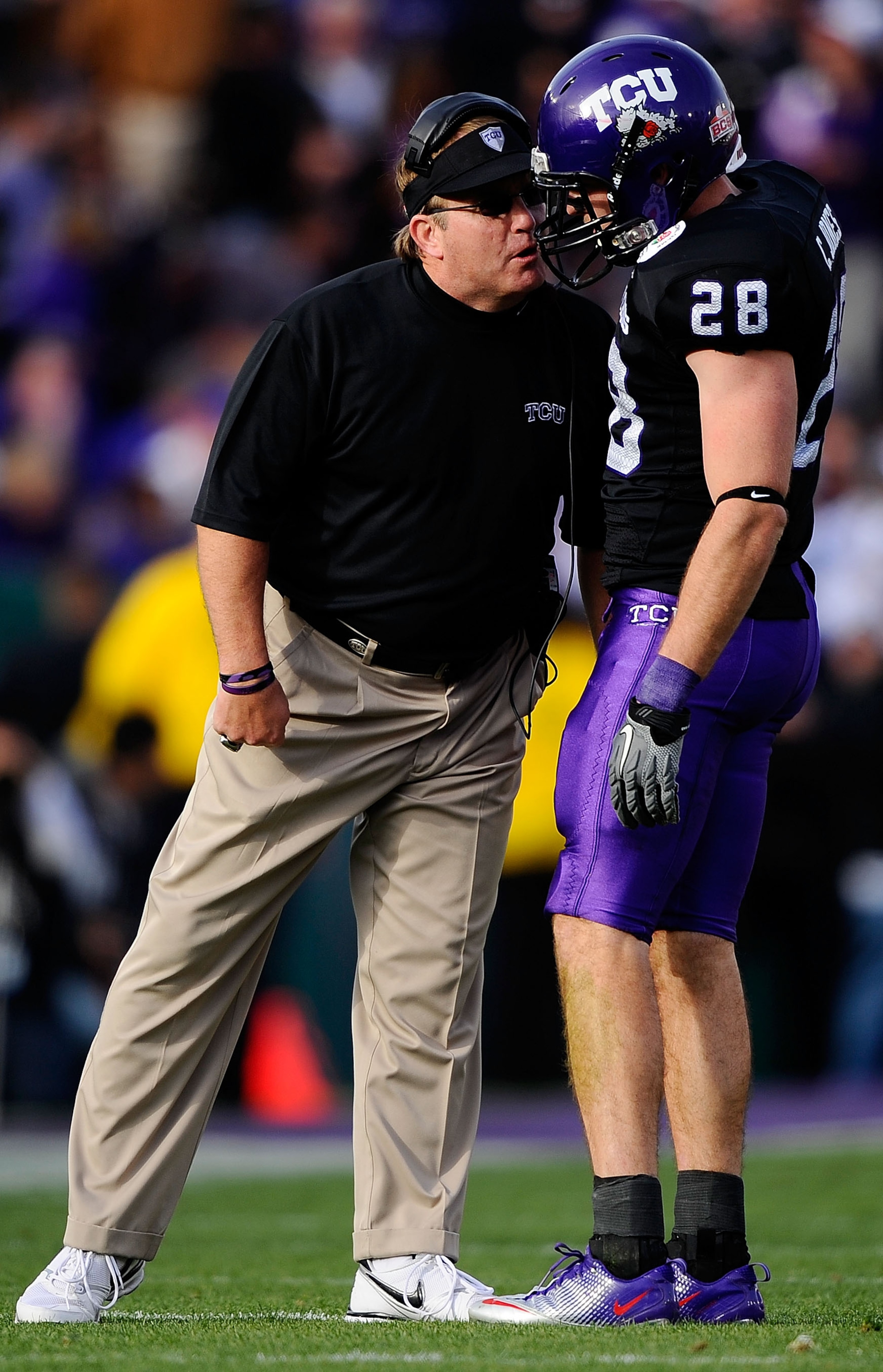 PASADENA, CA - JANUARY 01: Head coach Gary Patterson of the TCU Horned Frogs talks with safety Colin Jones #28 on the field during their game against the Wisconsin Badgers in the 97th Rose Bowl game on January 1, 2011 in Pasadena, California. (Photo by PASADENA, CA - JANUARY 01: Head coach Gary Patterson of the TCU Horned Frogs talks with safety Colin Jones #28 on the field during their game against the Wisconsin Badgers in the 97th Rose Bowl game on January 1, 2011 in Pasadena, California. (Photo by