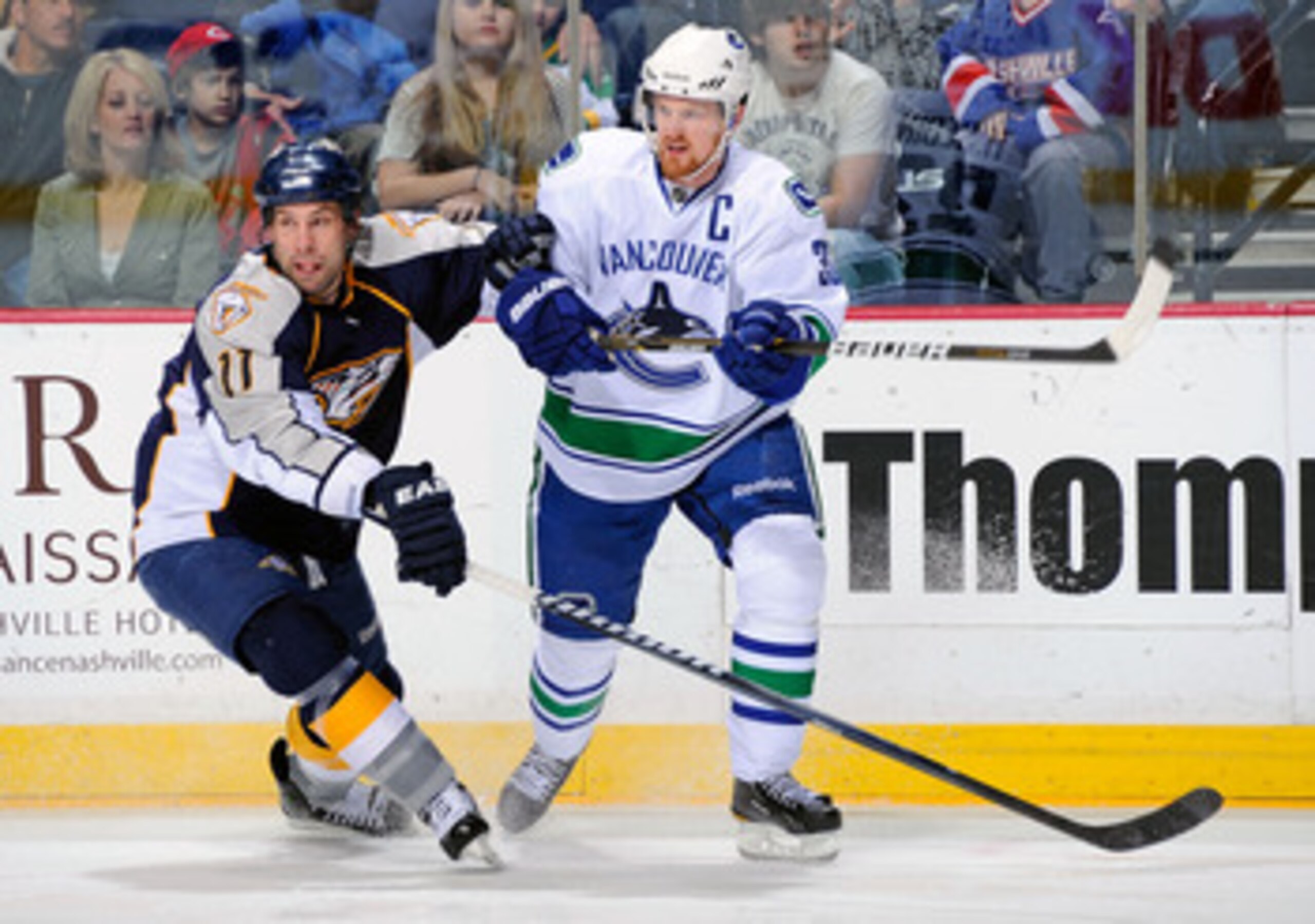 NASHVILLE, TN - MARCH 29: Henrik Sedin #33 of the Vancouver Canucks skates against David Legwand #11 of the Nashville Predators on March 29, 2011 at the Bridgestone Arena in Nashville, Tennessee. (Photo by Frederick Breedon/Getty Images) NASHVILLE, TN - MARCH 29: Henrik Sedin #33 of the Vancouver Canucks skates against David Legwand #11 of the Nashville Predators on March 29, 2011 at the Bridgestone Arena in Nashville, Tennessee. (Photo by Frederick Breedon/Getty Images)