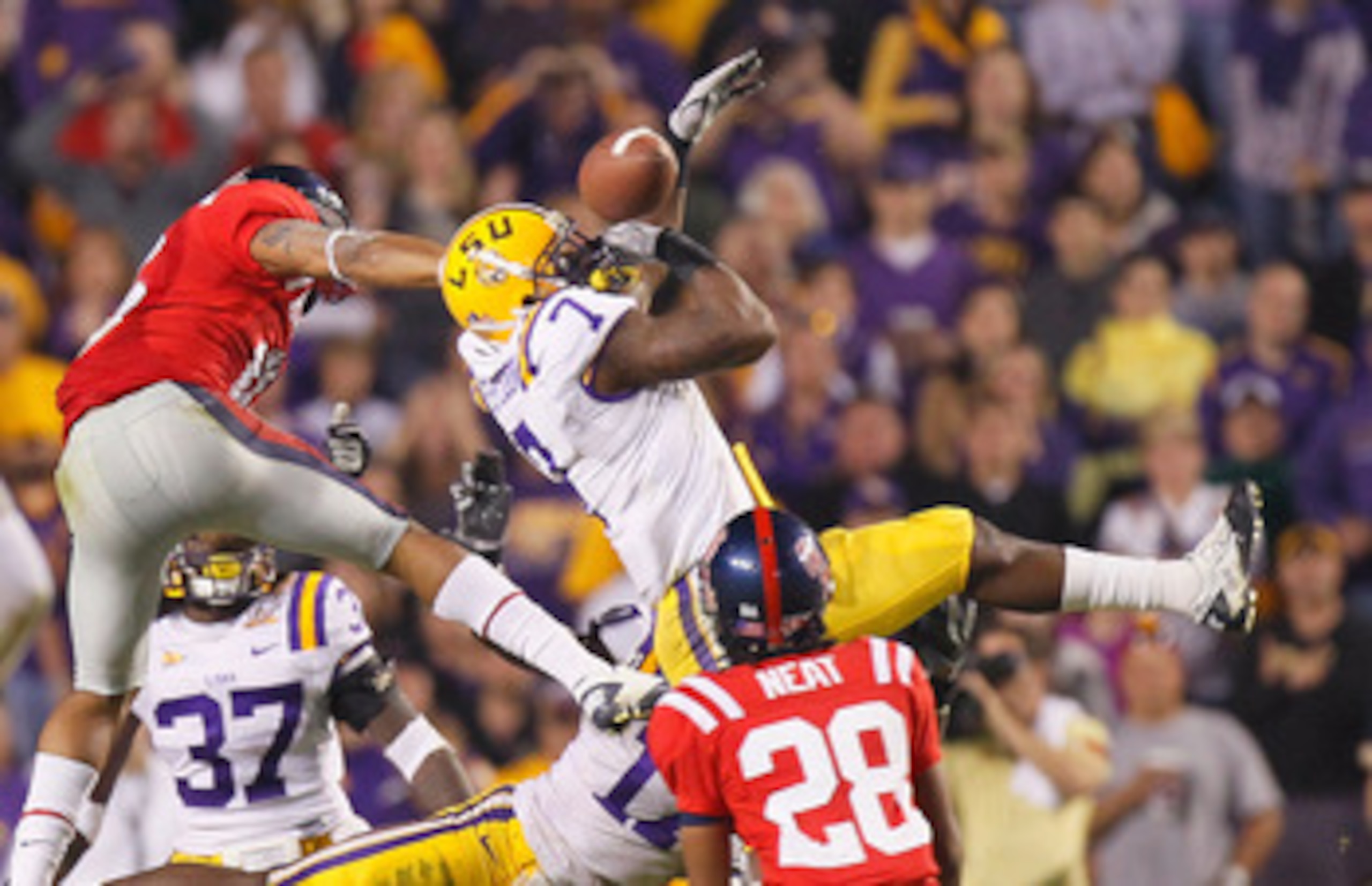 BATON ROUGE, LA - NOVEMBER 20: Patrick Peterson #7 of the Louisiana State University Tigers nearly intercepts a pass in the final seconds against Markeith Summers #16 and Korvic Neat #28 of the Ole Miss Rebels as time expired at Tiger Stadium on November BATON ROUGE, LA - NOVEMBER 20: Patrick Peterson #7 of the Louisiana State University Tigers nearly intercepts a pass in the final seconds against Markeith Summers #16 and Korvic Neat #28 of the Ole Miss Rebels as time expired at Tiger Stadium on November