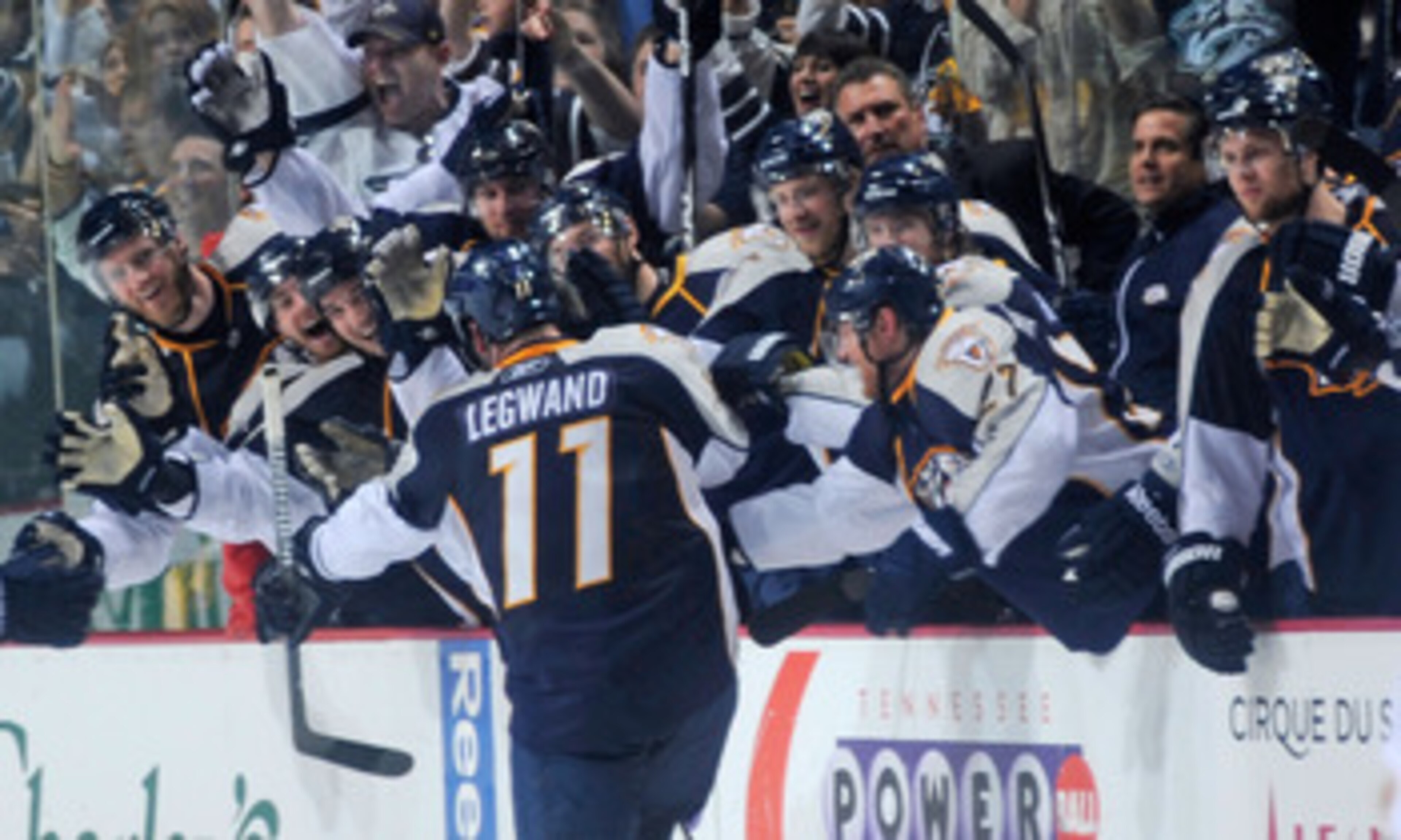 NASHVILLE, TN - APRIL 24:  David Legwand #11 of the Nashville Predators is congratulated by teammates after scoring an open net goal against the Anaheim Ducks  in Game Six of the Western Conference Quarterfinals during the 2011 NHL Stanley Cup Playoffs at