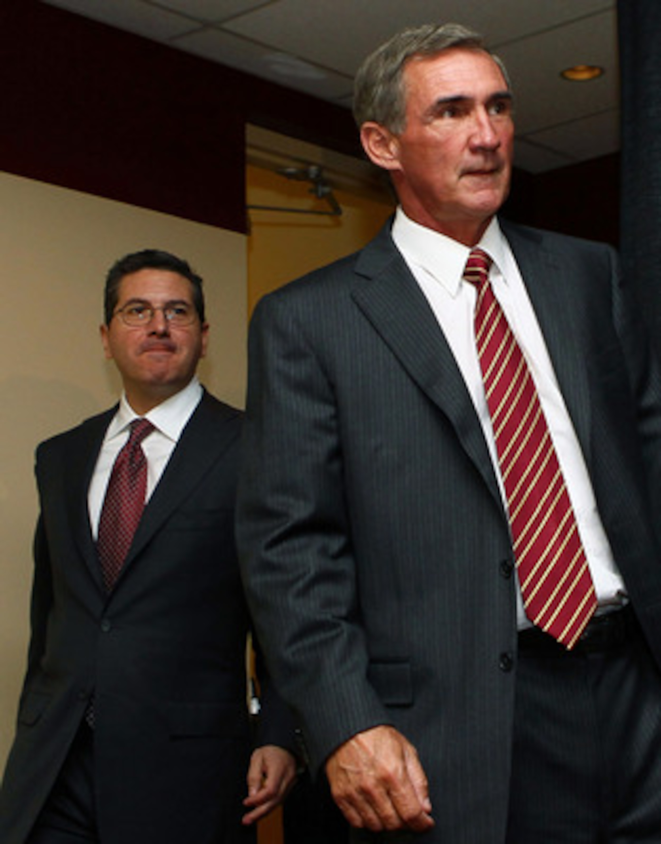 ASHBURN, VA - JANUARY 06: Mike Shanahan (R) arrives for a press conference with Washington Redskins owner Daniel Snyder (L) before being announced as the new head coach of the Washington Redskins on January 6, 2010 in Ashburn, Virginia. Shanahan replaces ASHBURN, VA - JANUARY 06: Mike Shanahan (R) arrives for a press conference with Washington Redskins owner Daniel Snyder (L) before being announced as the new head coach of the Washington Redskins on January 6, 2010 in Ashburn, Virginia. Shanahan replaces