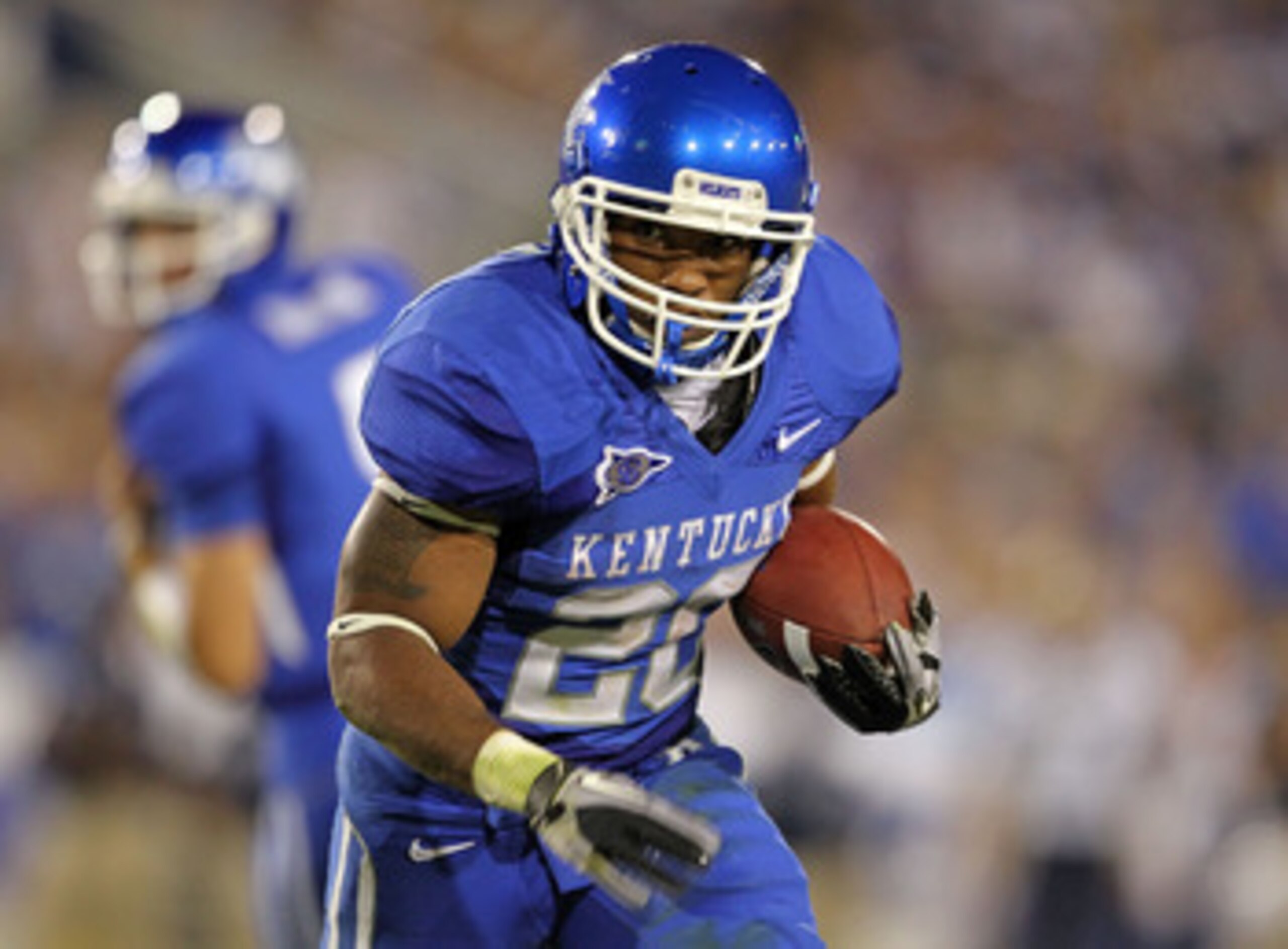 LEXINGTON, KY - SEPTEMBER 18: Derrick Locke #20 of the Kentucky Wildcats runs with the ball during the game against the Akron Zips at Commonwealth Stadium on September 18, 2010 in Lexington, Kentucky. (Photo by Andy Lyons/Getty Images) LEXINGTON, KY - SEPTEMBER 18: Derrick Locke #20 of the Kentucky Wildcats runs with the ball during the game against the Akron Zips at Commonwealth Stadium on September 18, 2010 in Lexington, Kentucky. (Photo by Andy Lyons/Getty Images)