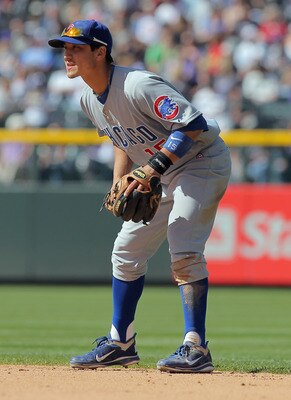DENVER, CO - APRIL 17:  Second baseman Darwin Barney #15 of the Chicago Cubs plays defense against the Colorado Rockies at Coors Field on April 17, 2011 in Denver, Colorado.  (Photo by Doug Pensinger/Getty Images)