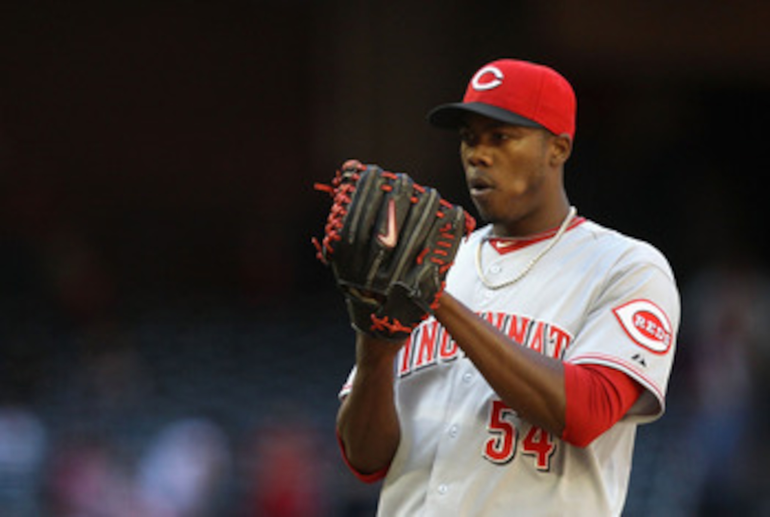 PHOENIX, AZ - APRIL 10:  Relief pitcher Aroldis Chapman #54 of the Cincinnati Reds pitches against the Arizona Diamondbacks during the Major League Baseball game at Chase Field on April 10, 2011 in Phoenix, Arizona. The Diamondbacks defeated the Reds 10-8