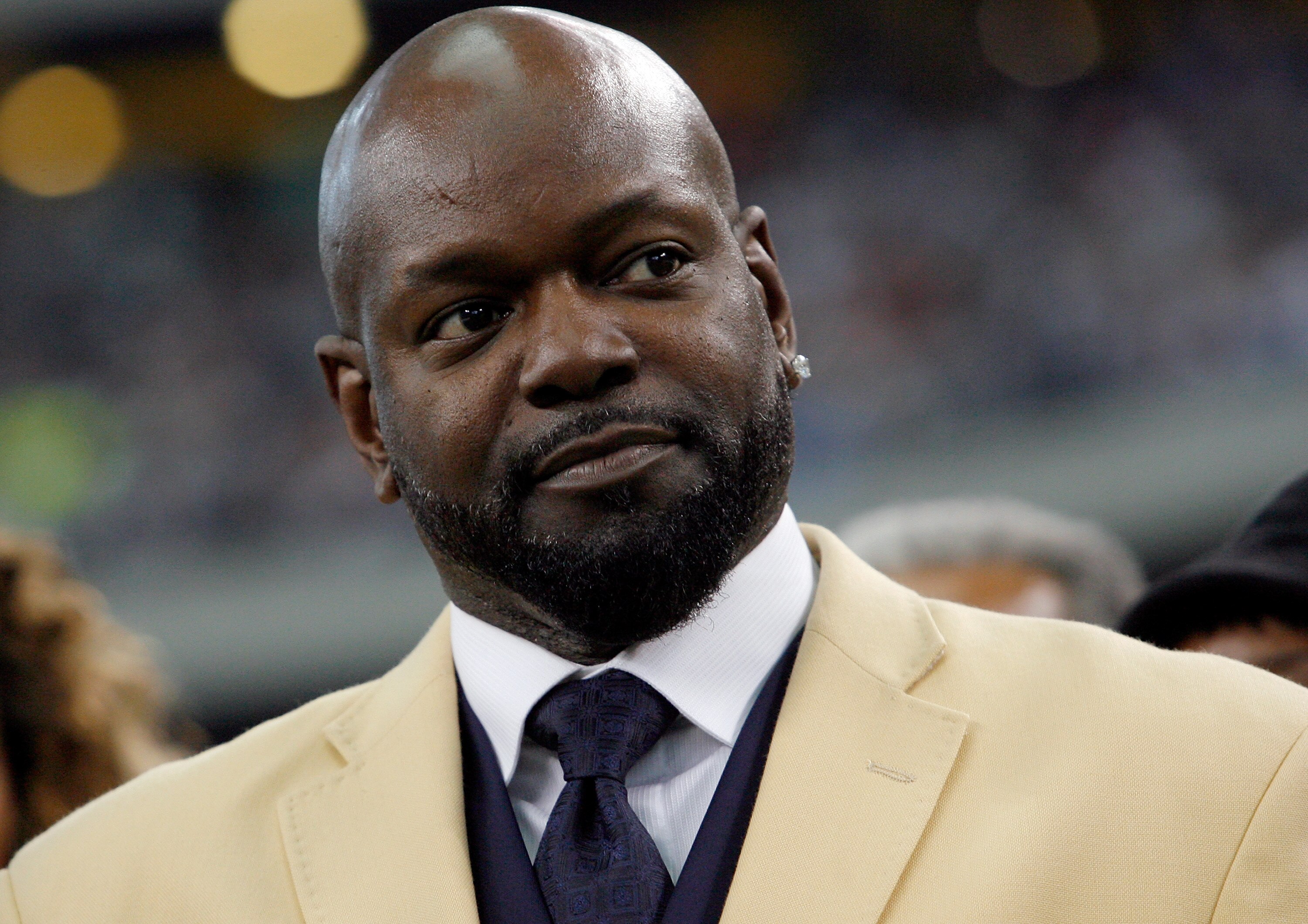 ARLINGTON, TX - NOVEMBER 21:  Former Dallas Cowboys running back Emmitt Smith as Smith prepares to receive his Hall of Fame ring during a halftime ceremony at Cowboys Stadium on November 21, 2010 in Arlington, Texas.  (Photo by Tom Pennington/Getty Images