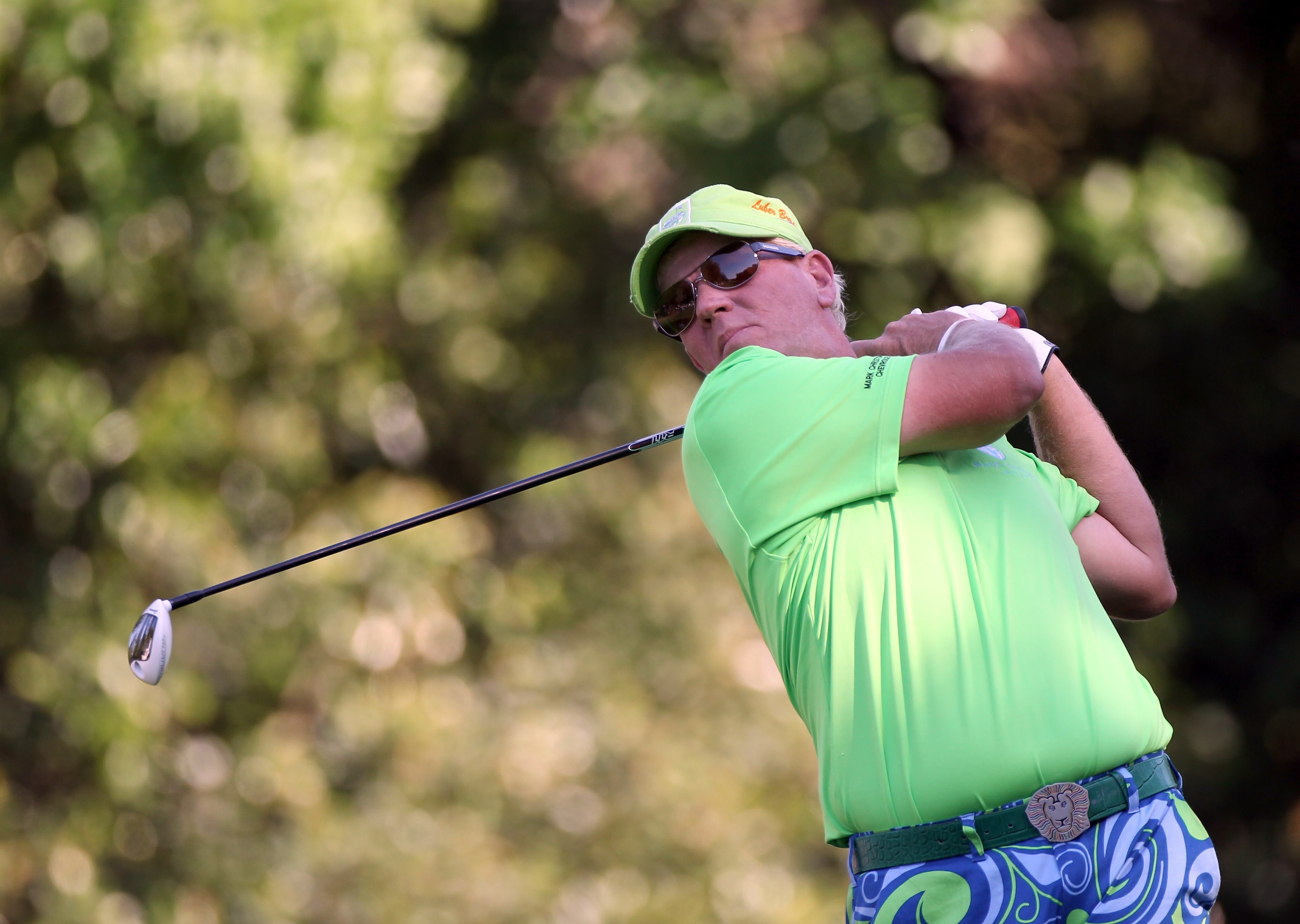 PALM HARBOR, FL - MARCH 17:  John Daly plays a shot during the first round of the Transitions Championship at Innisbrook Resort and Golf Club on March 17, 2011 in Palm Harbor, Florida.  (Photo by Sam Greenwood/Getty Images)