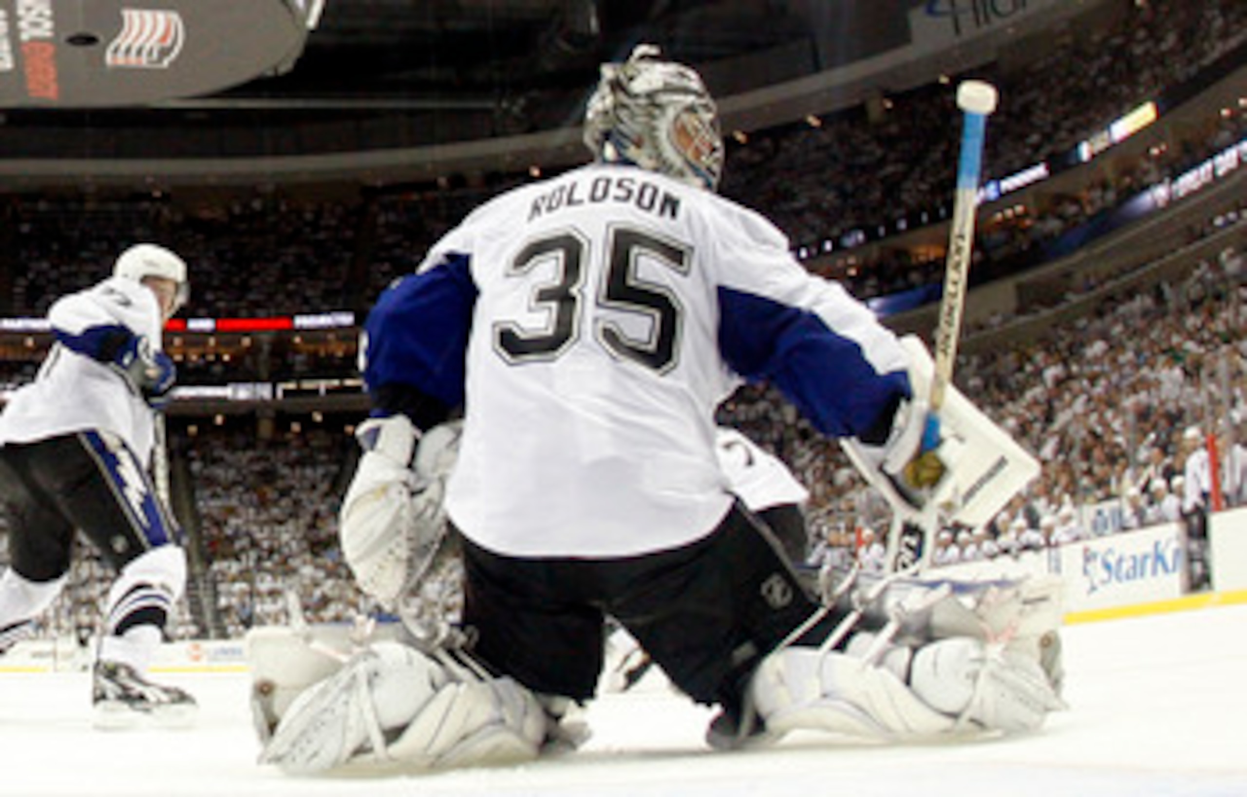 PITTSBURGH, PA - APRIL 27:  Dwayne Roloson #35 of the Tampa Bay Lightning protects the net against the Pittsburgh Penguins in Game Seven of the Eastern Conference Quarterfinals during the 2011 NHL Stanley Cup Playoffs at Consol Energy Center on April 27, 