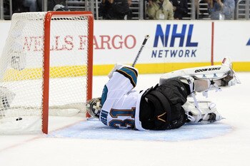 LOS ANGELES, CA - APRIL 21:  Antti Niemi #31 of the San Jose Sharks lays on the ice after allowing a goal by the Los Angeles Kings in the second period of game four of the Western Conference Quarterfinals during the 2011 NHL Stanley Cup Playoffs at Staple