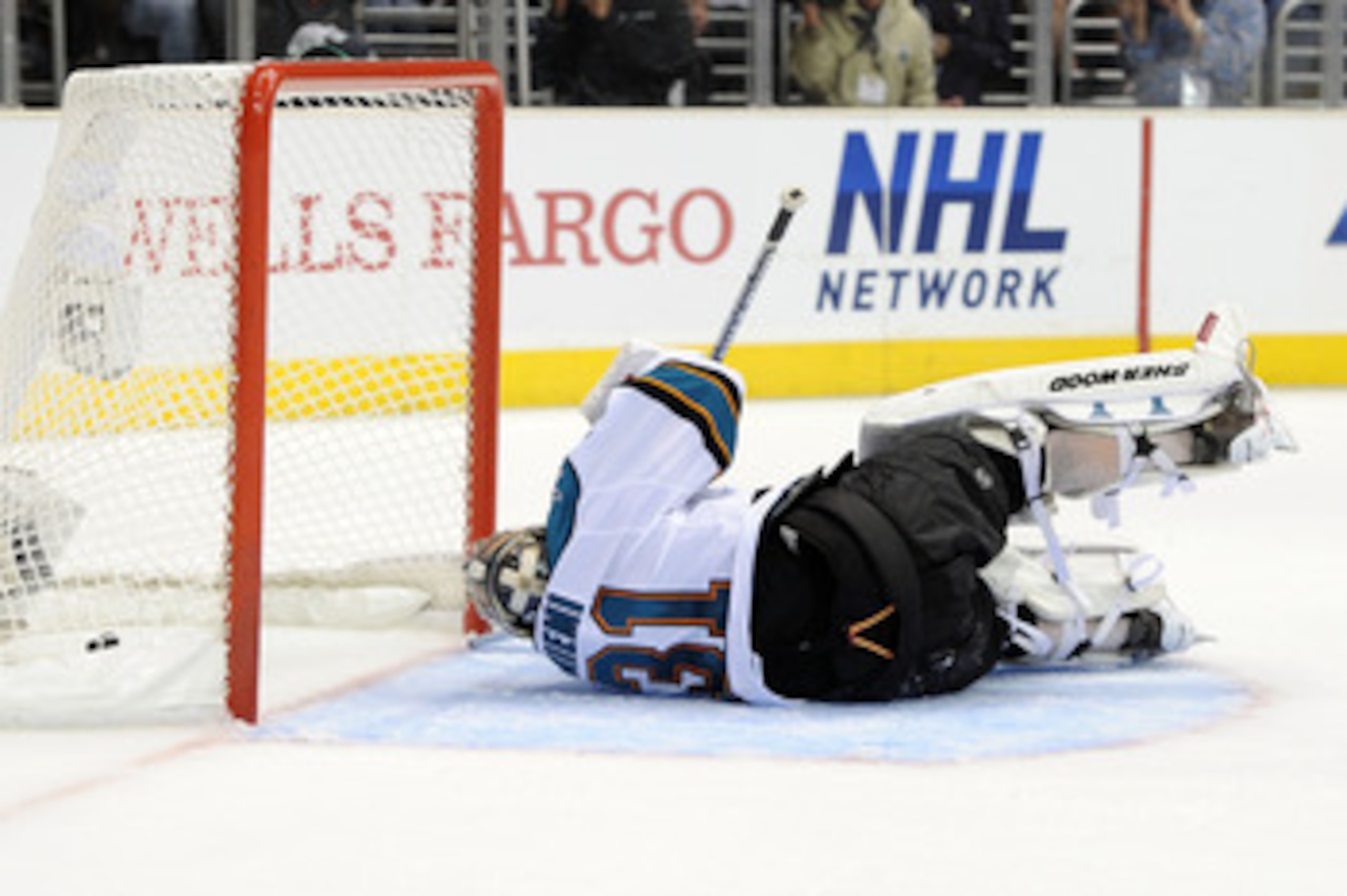 LOS ANGELES, CA - APRIL 21:  Antti Niemi #31 of the San Jose Sharks lays on the ice after allowing a goal by the Los Angeles Kings in the second period of game four of the Western Conference Quarterfinals during the 2011 NHL Stanley Cup Playoffs at Staple