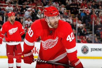 DETROIT, MI - FEBRUARY 13:  Henrik Zetterberg #40 of the Detroit Red Wings looks on the Boston Bruins on February 13, 2011 in Detroit, Michigan.  (Photo by Gregory Shamus/Getty Images)