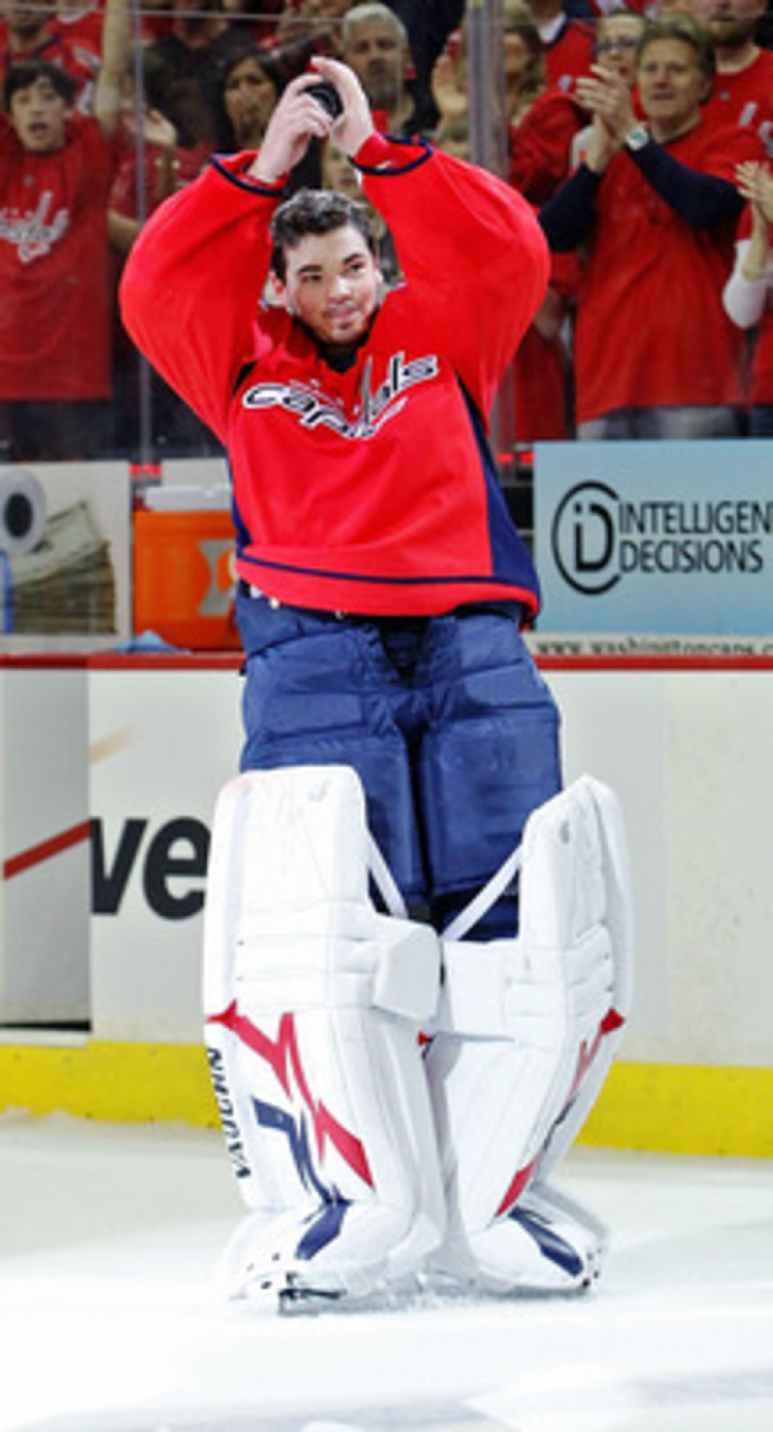 WASHINGTON , DC - APRIL 23:  Michal Neuvirth #30 of the Washington Capitals celebrates being named the first star of the game against the New York Rangers in Game Five of the Eastern Conference Quarterfinals during the 2011 NHL Stanley Cup Playoffs at the
