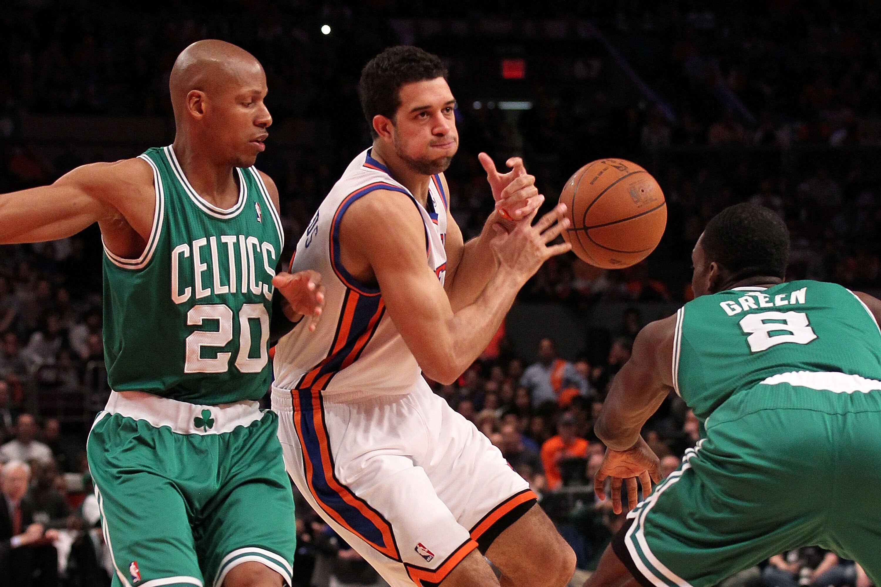 NEW YORK, NY - APRIL 22:  Landry Fields #6 of the New York Knicks loses the ball as he drives against Ray Allen #20 (L) and Jeff Green #8 of the Boston Celtics in Game Three of the Eastern Conference Quarterfinals in the 2011 NBA Playoffs on April 22, 201