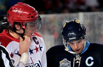 PITTSBURGH, PA - JANUARY 01:  Alex Ovechkin #8 of the Washington Capitals and Sidney Crosby #81 of the Pittsburgh Penguins are seen during the 2011 NHL Bridgestone Winter Classic at Heinz Field on January 1, 2011 in Pittsburgh, Pennsylvania. Washington wo